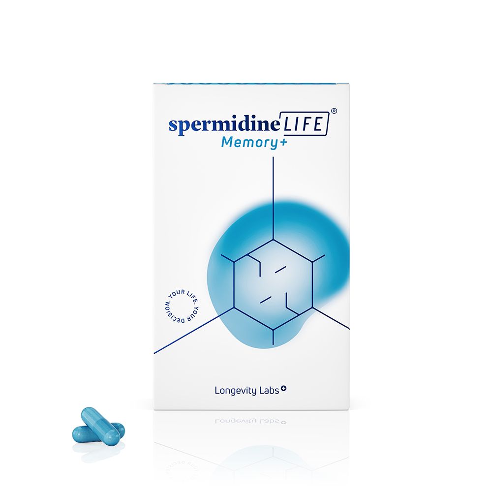 Weiße Schachtel spermidineLIFE Memory+ mit blauer Grafik und Logo. Zwei blaue Kapseln liegen davor.