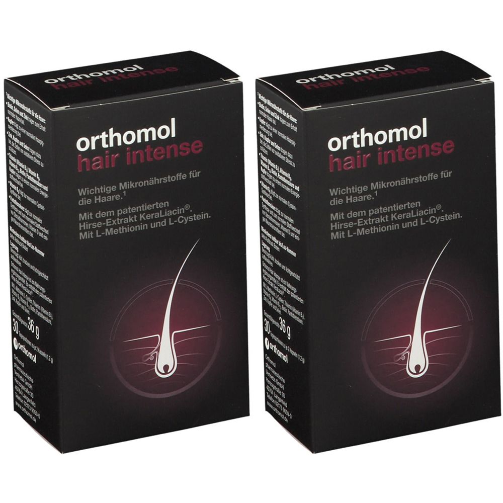 Zwei Schachteln mit "orthomol hair intense". Schwarze Verpackung mit roter Schrift und einem Haarsymbol.