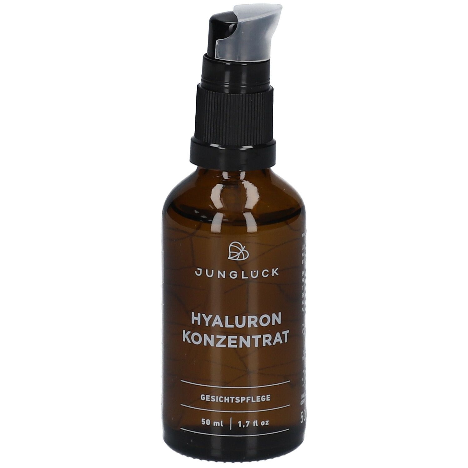 Braune Glasflasche mit schwarzem Pumpkopf. Aufschrift: JUNGLÜCK Hyaluron Konzentrat. Gesichtspflege. 50 ml.