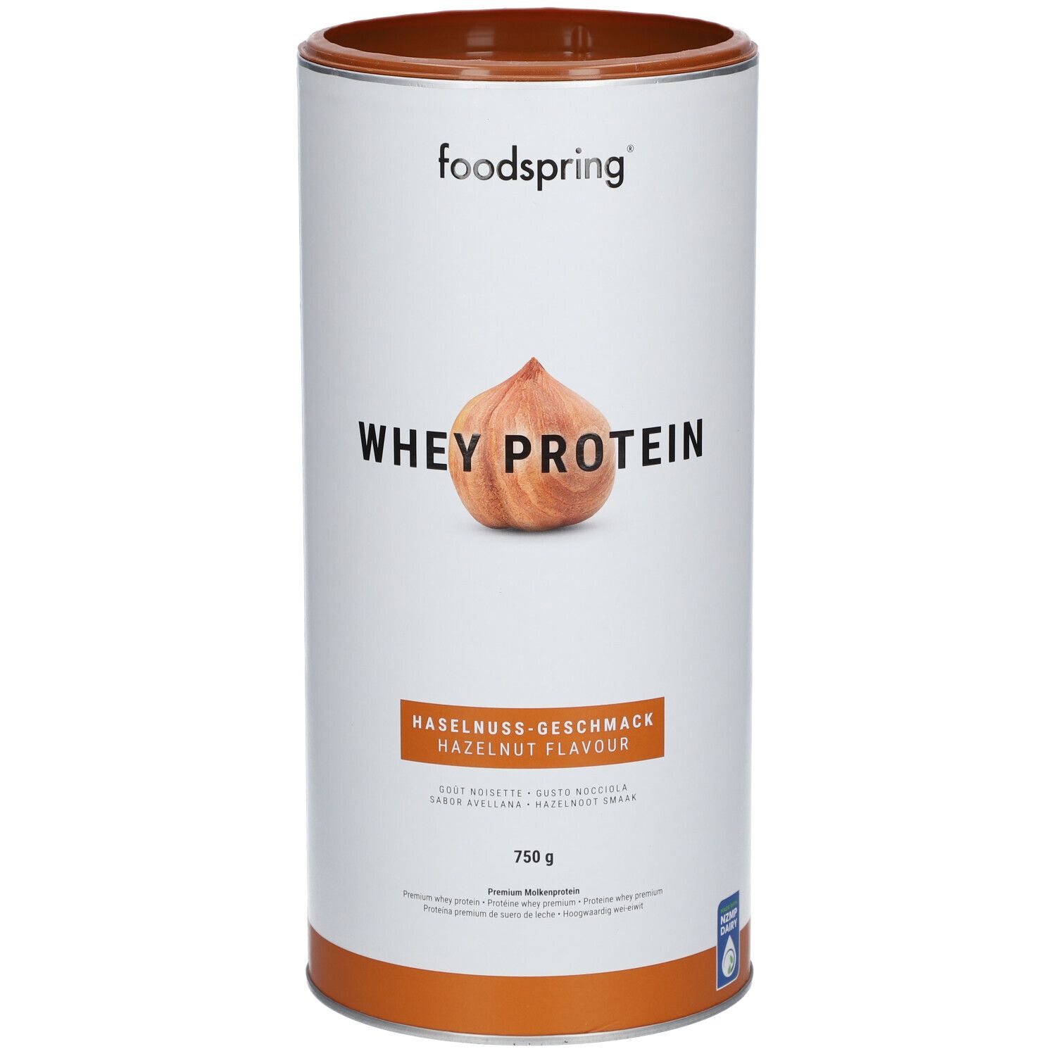 Zylinderdose mit "foodspring"-Logo und "Whey Protein". Haselnuss-Geschmack. Abbildung einer Haselnuss. 750 g.