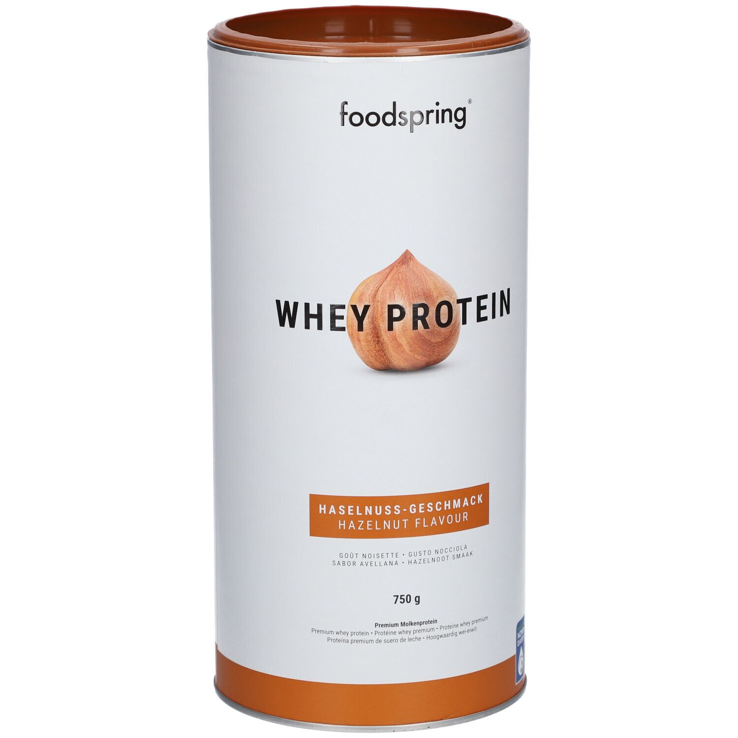 Zylinderdose mit "foodspring"-Logo und "Whey Protein". Haselnuss-Geschmack. Abbildung einer Haselnuss. 750 g.