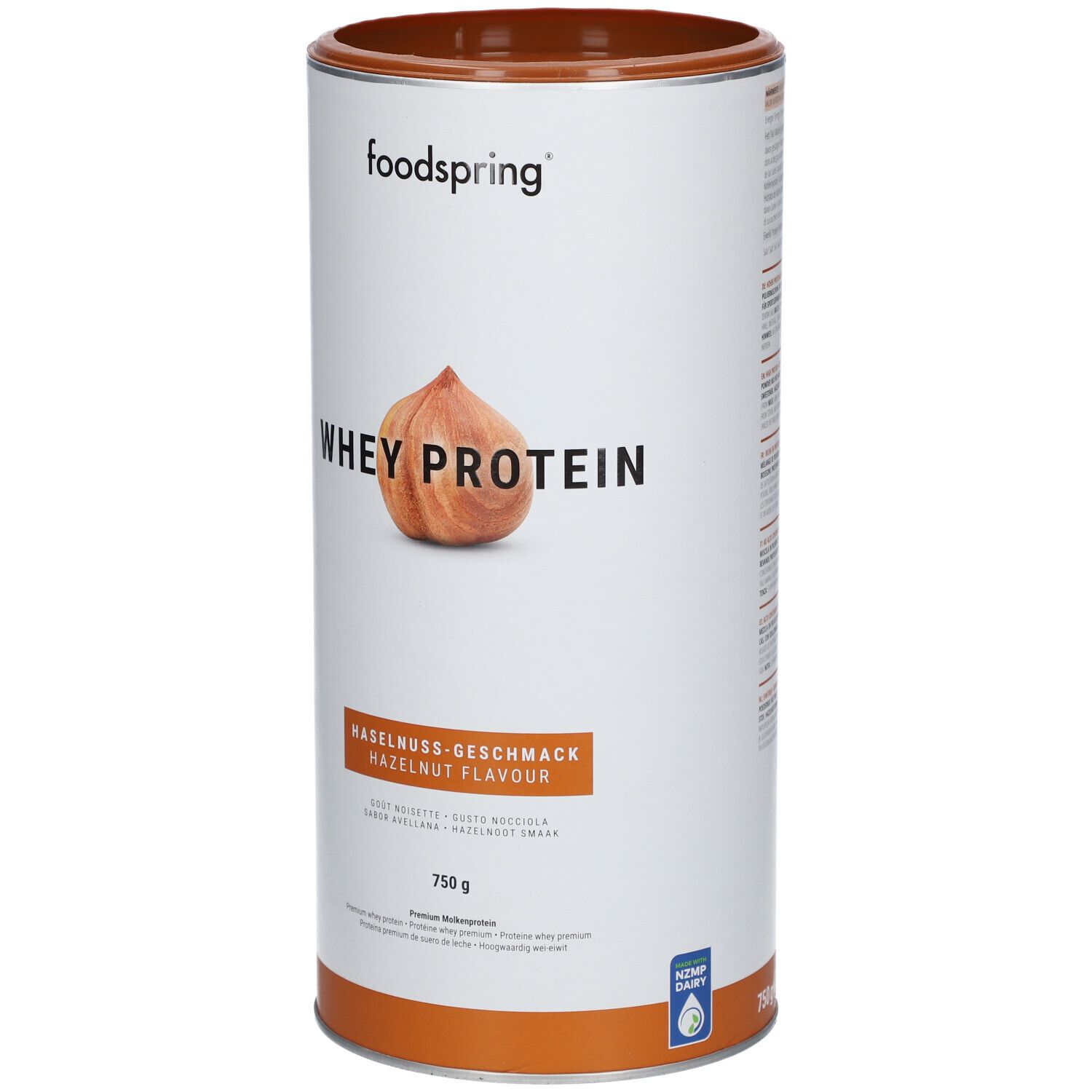 Zylinderdose mit "foodspring"-Logo und "Whey Protein". Haselnuss-Geschmack. Abbildung einer Haselnuss. 750 g.