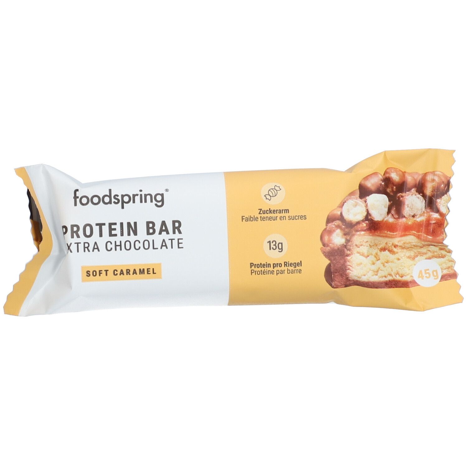 Proteinriegel mit Soft Caramel. Verpackung mit Produktbezeichnung und Nährwertangaben. foodspring Logo sichtbar.