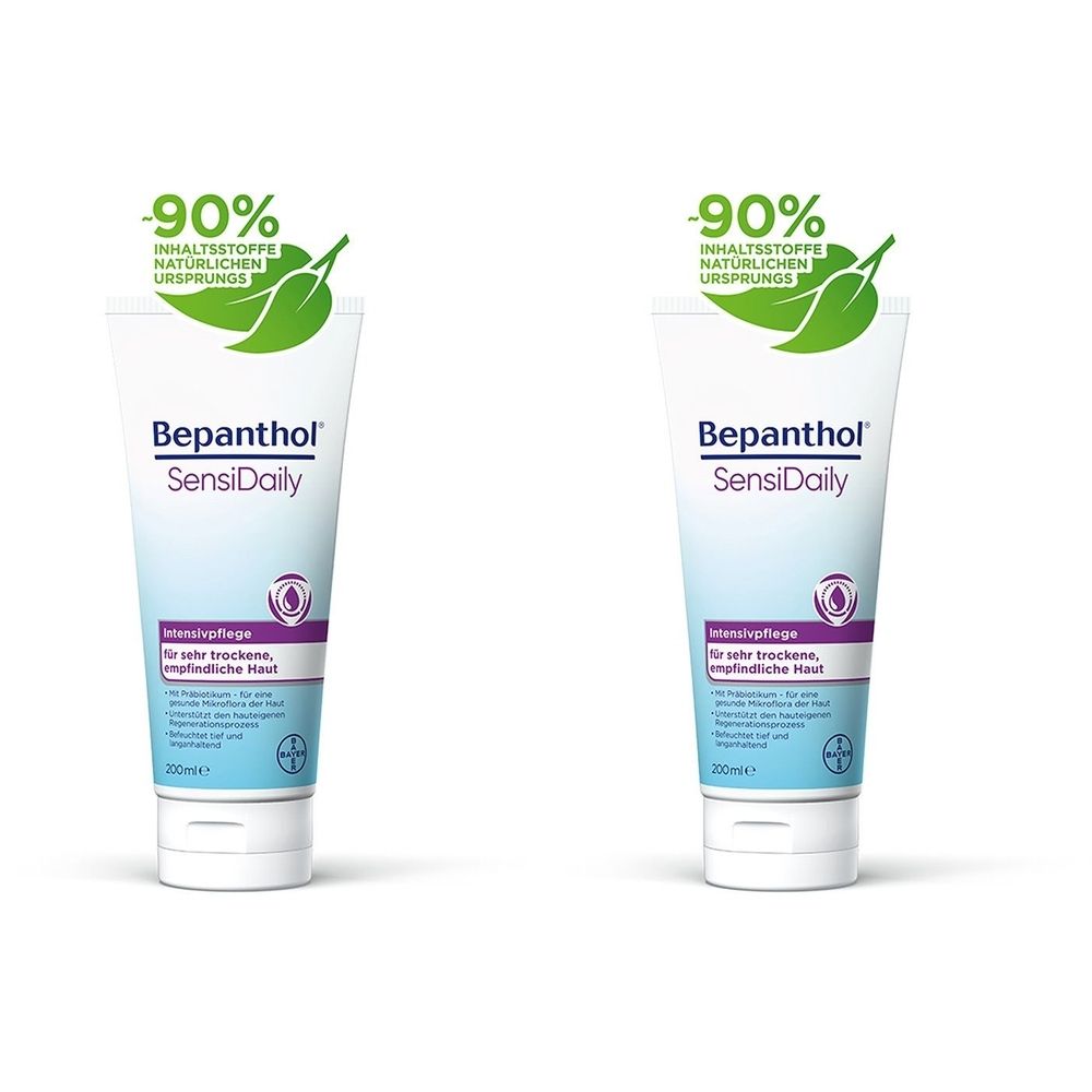 Zwei Tuben Bepanthol SensiDaily Intensivpflege. Weiße Tuben mit blauer und lila Beschriftung. Oben links: -90% Inhaltsstoffe natürlichen Ursprungs.