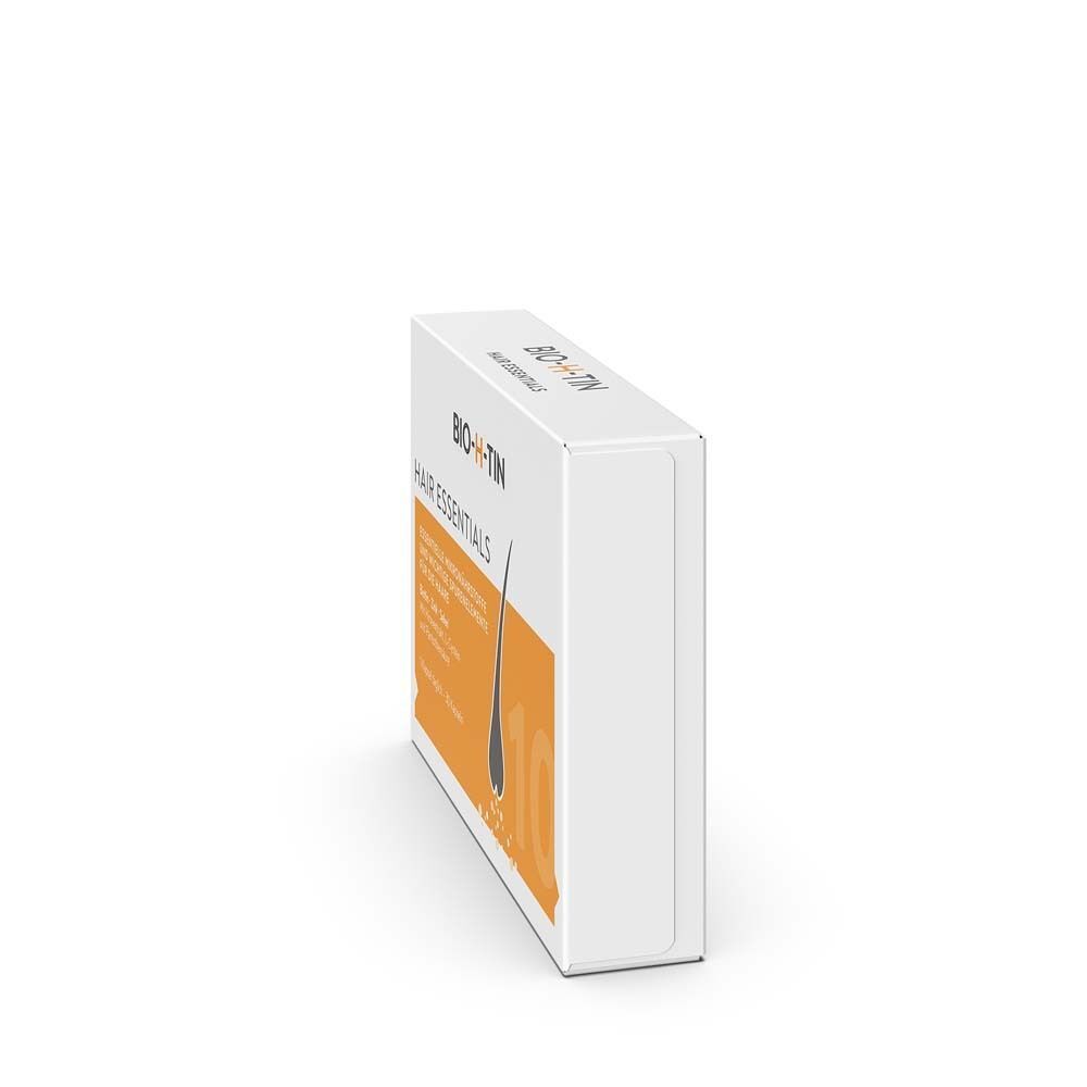 BIO-H-TIN Hair Essentials Packung, Seitenansicht. Weiße Schachtel mit orangefarbenem Feld und Produktinformationen.