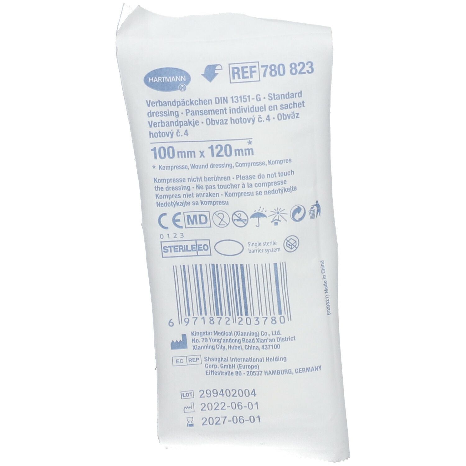 Verpakking met productinformatie. Tekst: Hartmann, verband, 100 mm x 120 mm. Barcode en CE-markering.