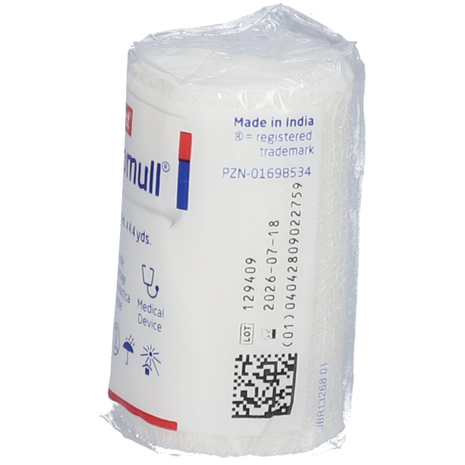 Bande de fixation Elastomull, emballée. Inscriptions : marque, nom du produit, taille, symboles médicaux, date de péremption, code-barres.