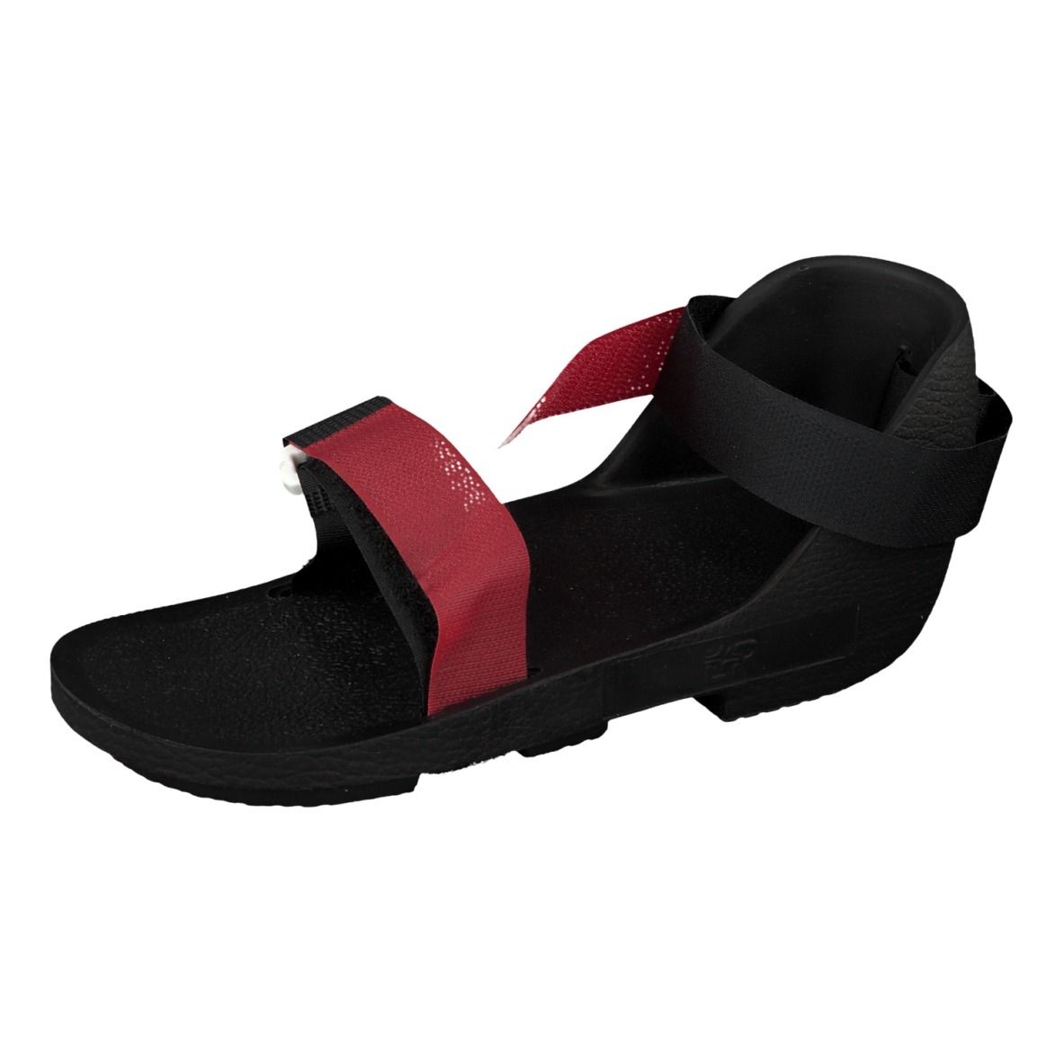 Chaussure noire avec sangle rouge. Fermeture velcro. Vue latérale.