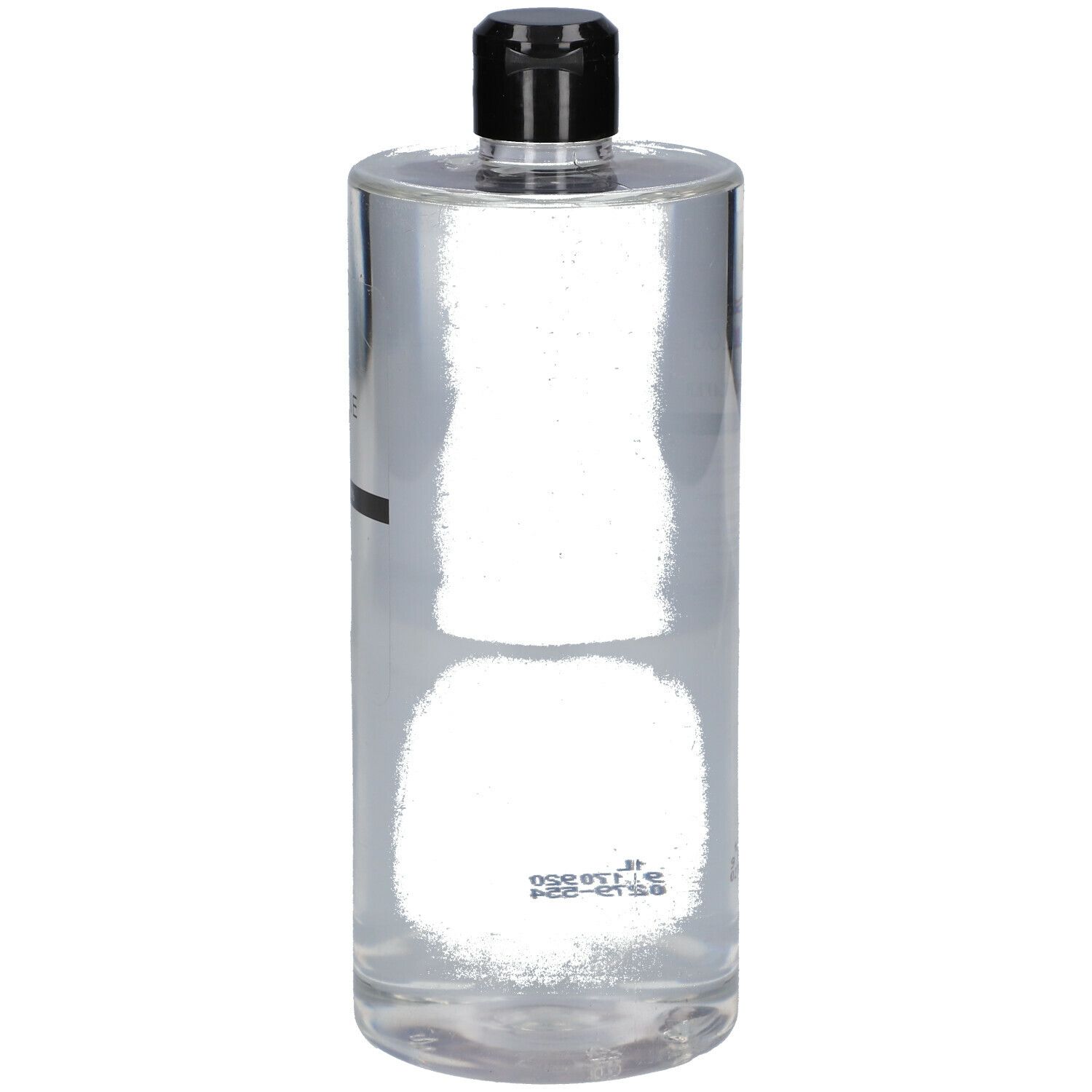 Flacon transparent avec bouchon noir. Étiquette avec texte.