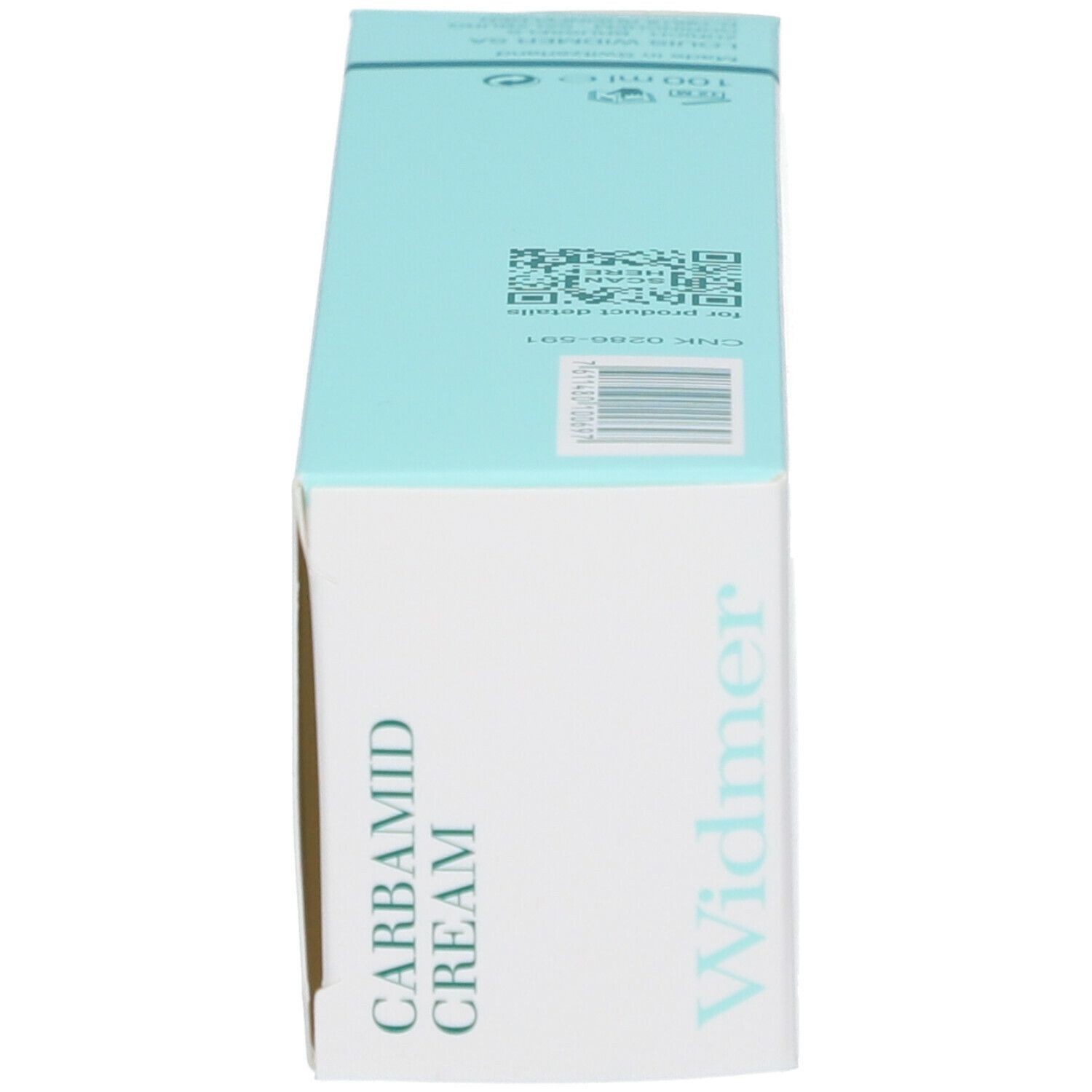 Kartonverpackung, türkisfarben, mit Aufschrift 'Carbamid Creme' und 'Widmer'.