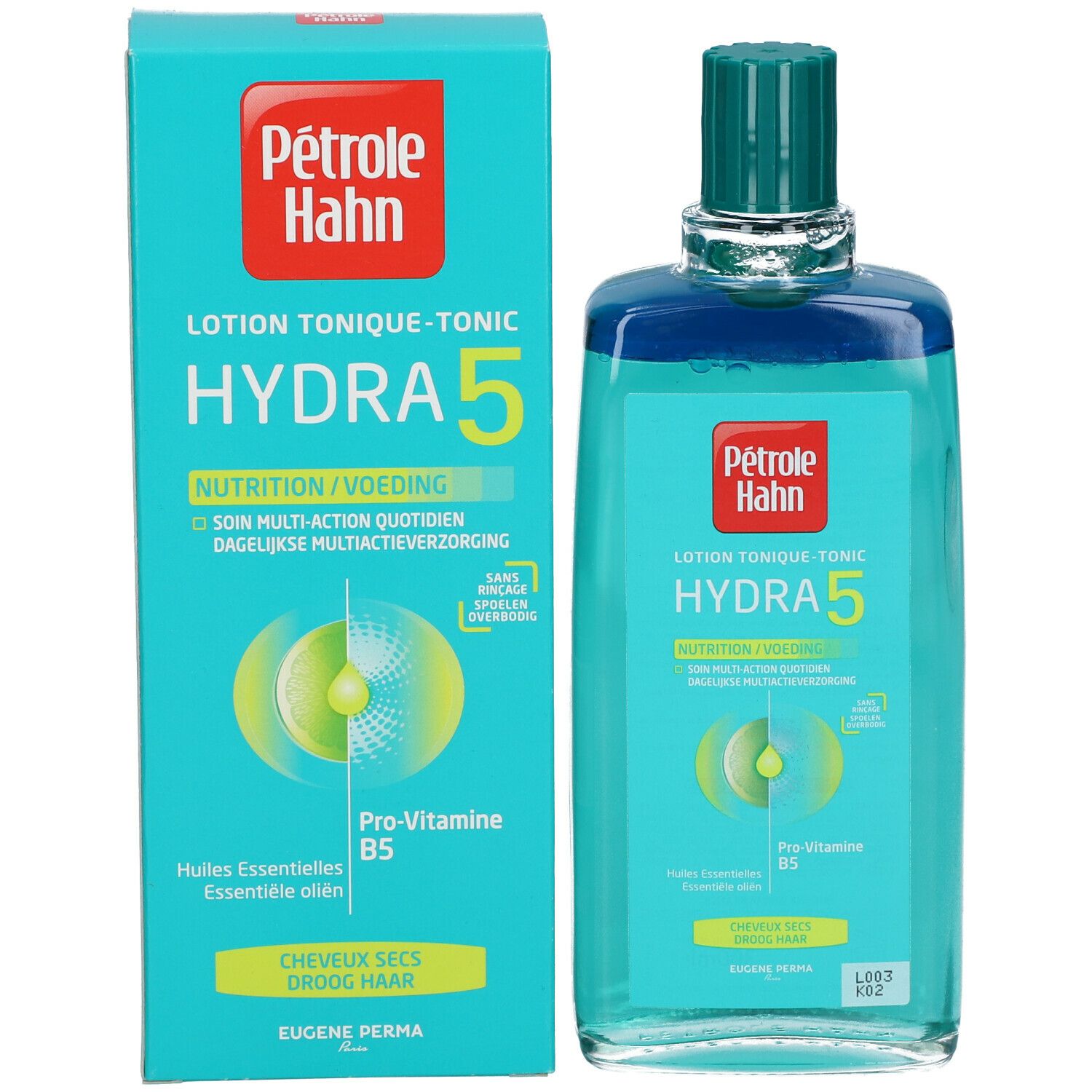 Verpakking en fles. Opschrift: Pétrole Hahn, Hydra 5, Lotion Tonique-Tonic. Voor droog haar. Bevat Pro-Vitamine B5.