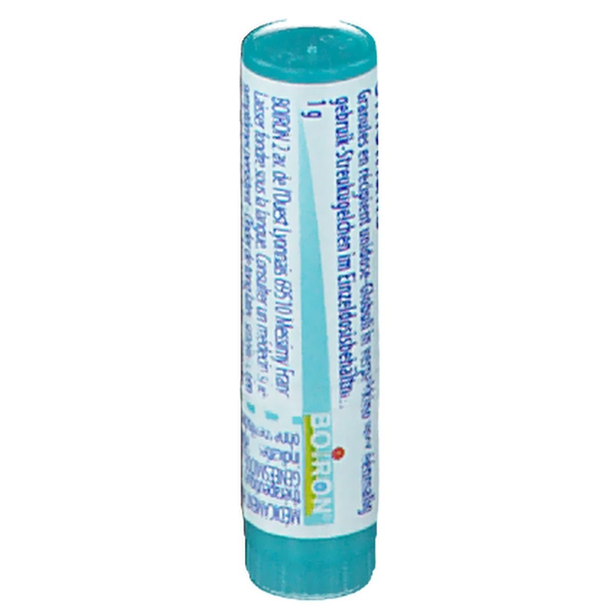 Tube cylindrique bleu et blanc. Texte: BOIRON, 1g. Contient des globules.