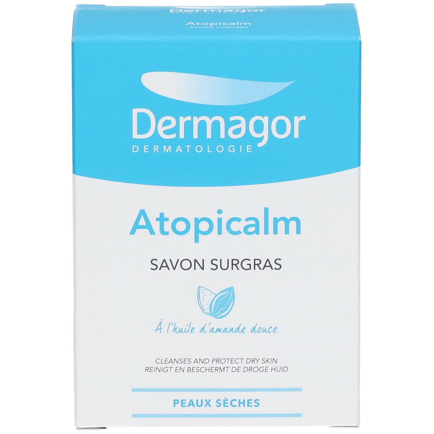 Blaue und weiße Schachtel, Produktname und Logo. Text: Dermagor, Atopicalm Savon Surgras, für trockene Haut. Mandelöl.