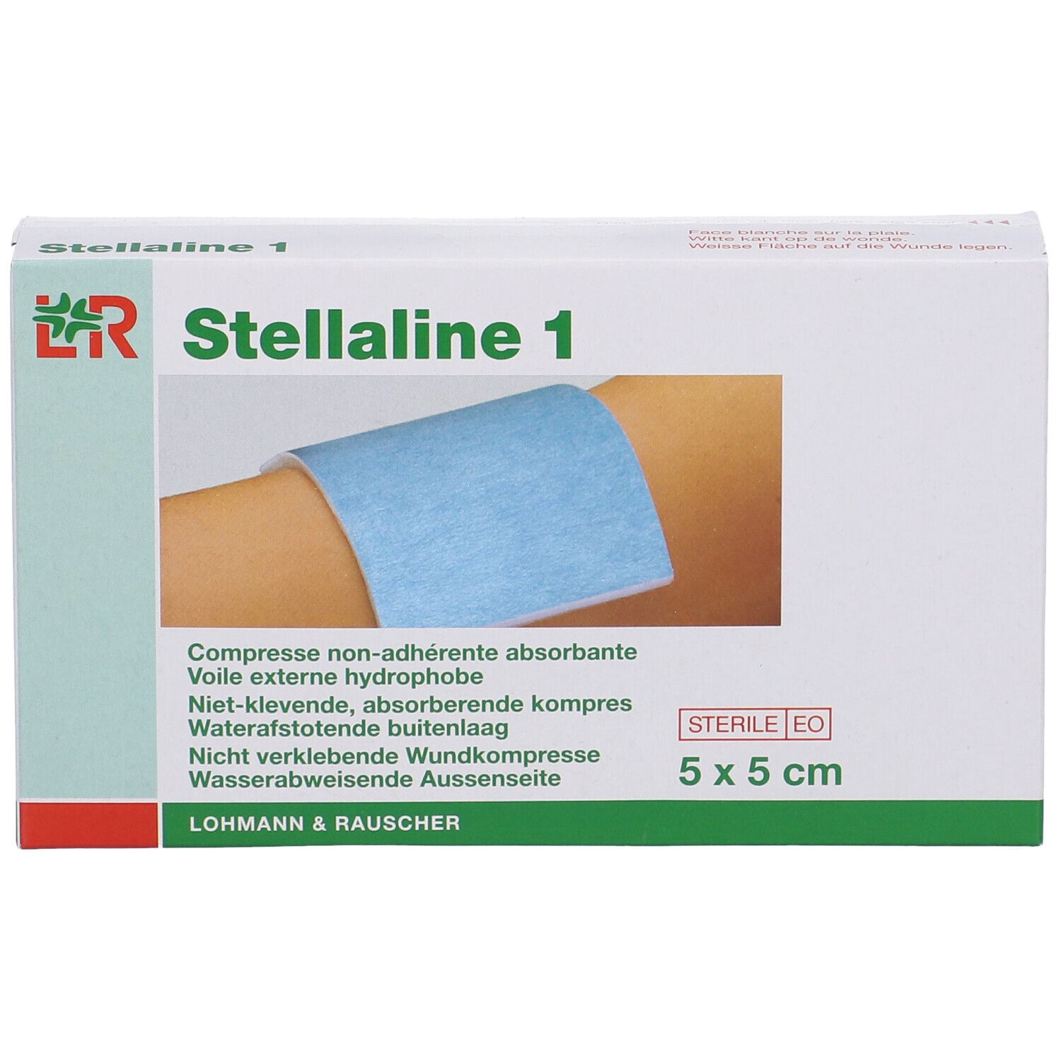 Emballage de Stellaline 1. Compresse bleue sur un bras. Dimensions : 5x5 cm. Texte : Non-adhérent, absorbant.