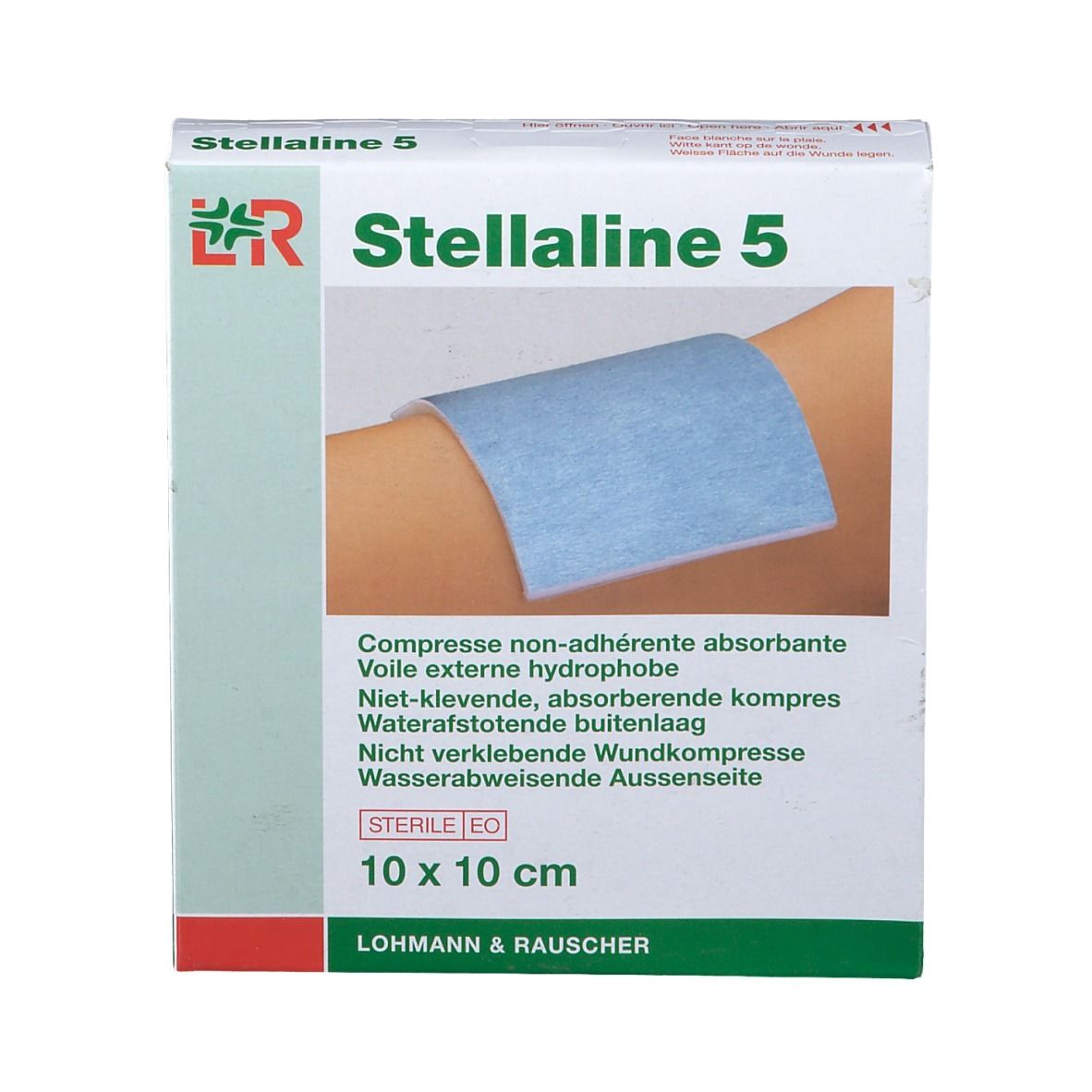 Verpakking van Stellaline 5, 10x10 cm. Een verband op een arm. Opschriften: STERILE EO, Lohmann & Rauscher.