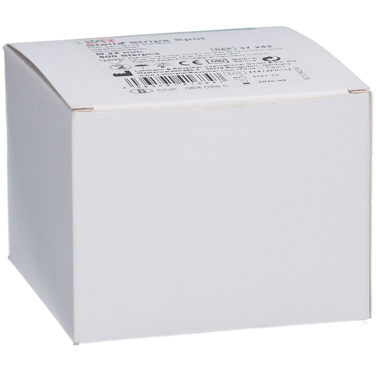 Emballage de produit blanc. Informations produit et bande verte sur le dessus.