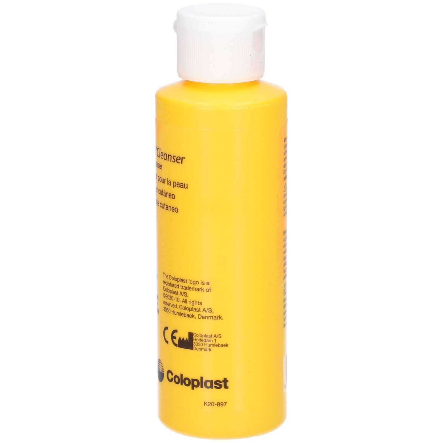 Flacon jaune avec bouchon blanc. Inscription: Comfeel Cleanser. Logo Coloplast. Marque CE.