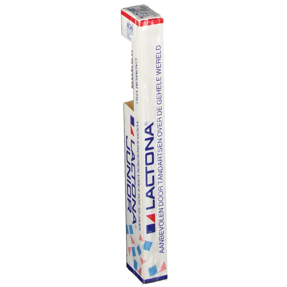 Emballage de la brosse à dents. Blanc avec logo et texte. Brosse partiellement visible.