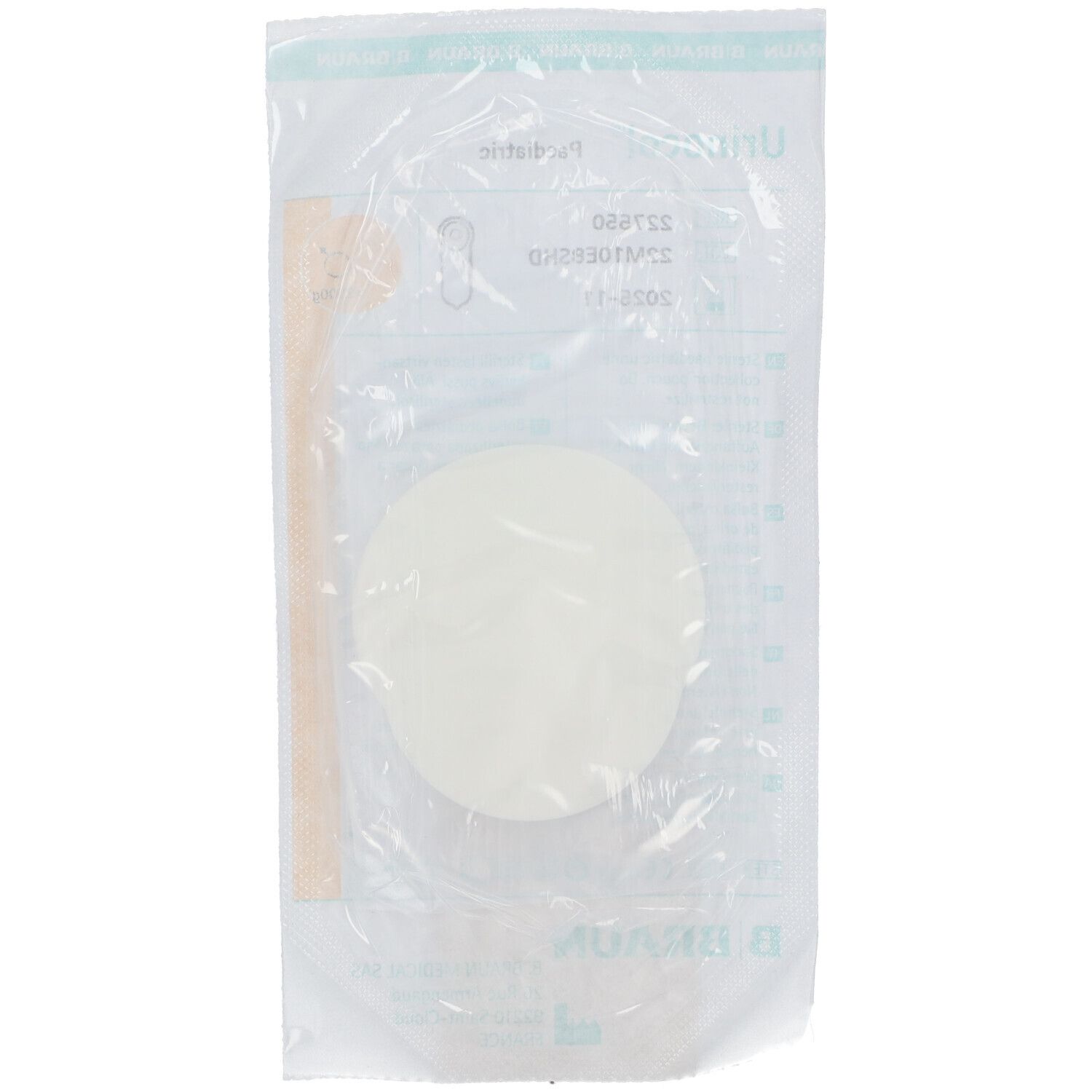 Objet rond blanc dans un emballage transparent. Informations produit visibles.