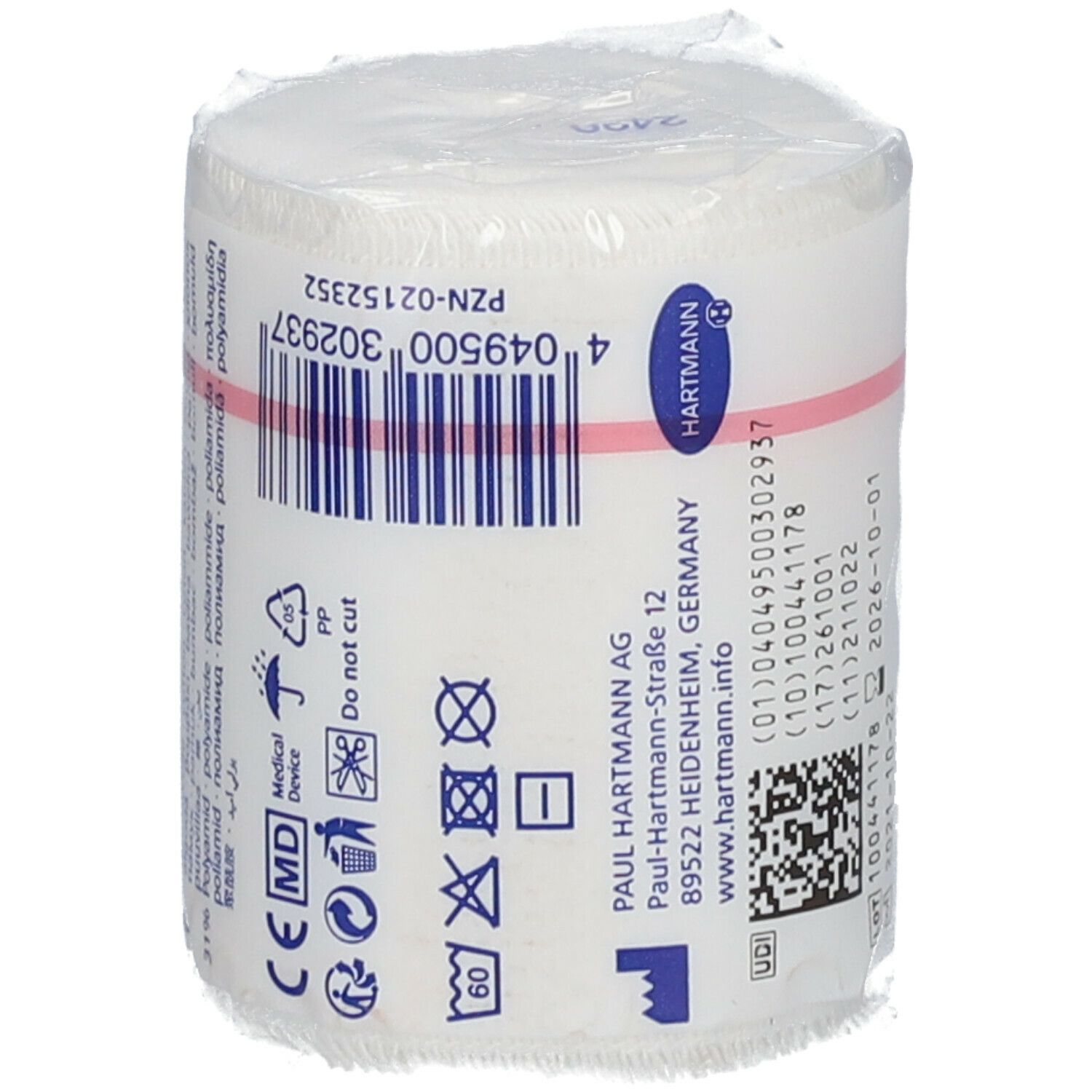 Bande élastique Idealast blanche, emballée dans du film plastique. Inscriptions: Hartmann, PZN, avertissements, adresse du fabricant.