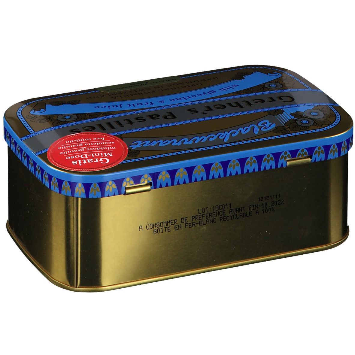 Boîte dorée avec couvercle bleu et inscription "Grether's Pastilles Blackcurrant". Autocollant rouge "Gratis Mini-Dose".