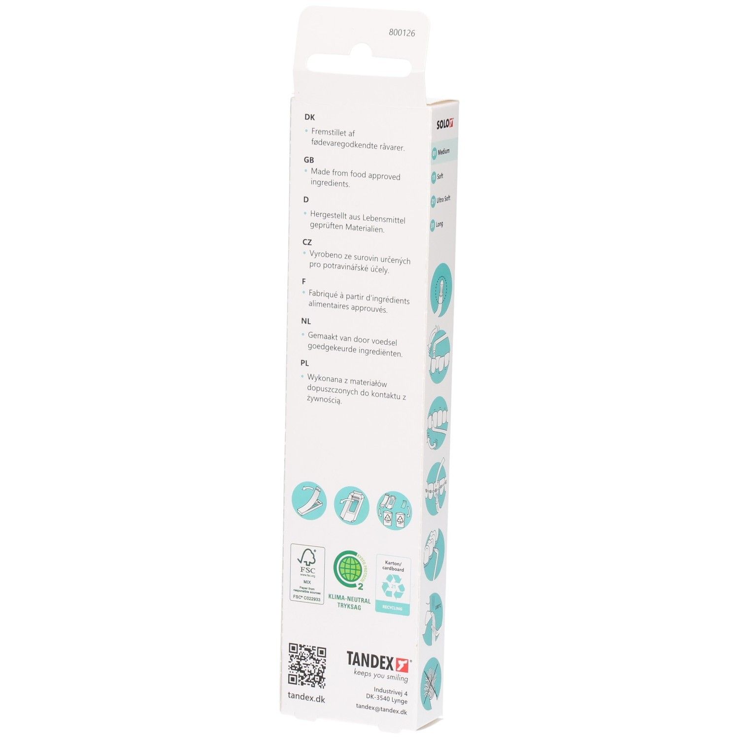 Rückseite der Verpackung einer Tandex Solo Zahnbürste mit Materialinformationen.