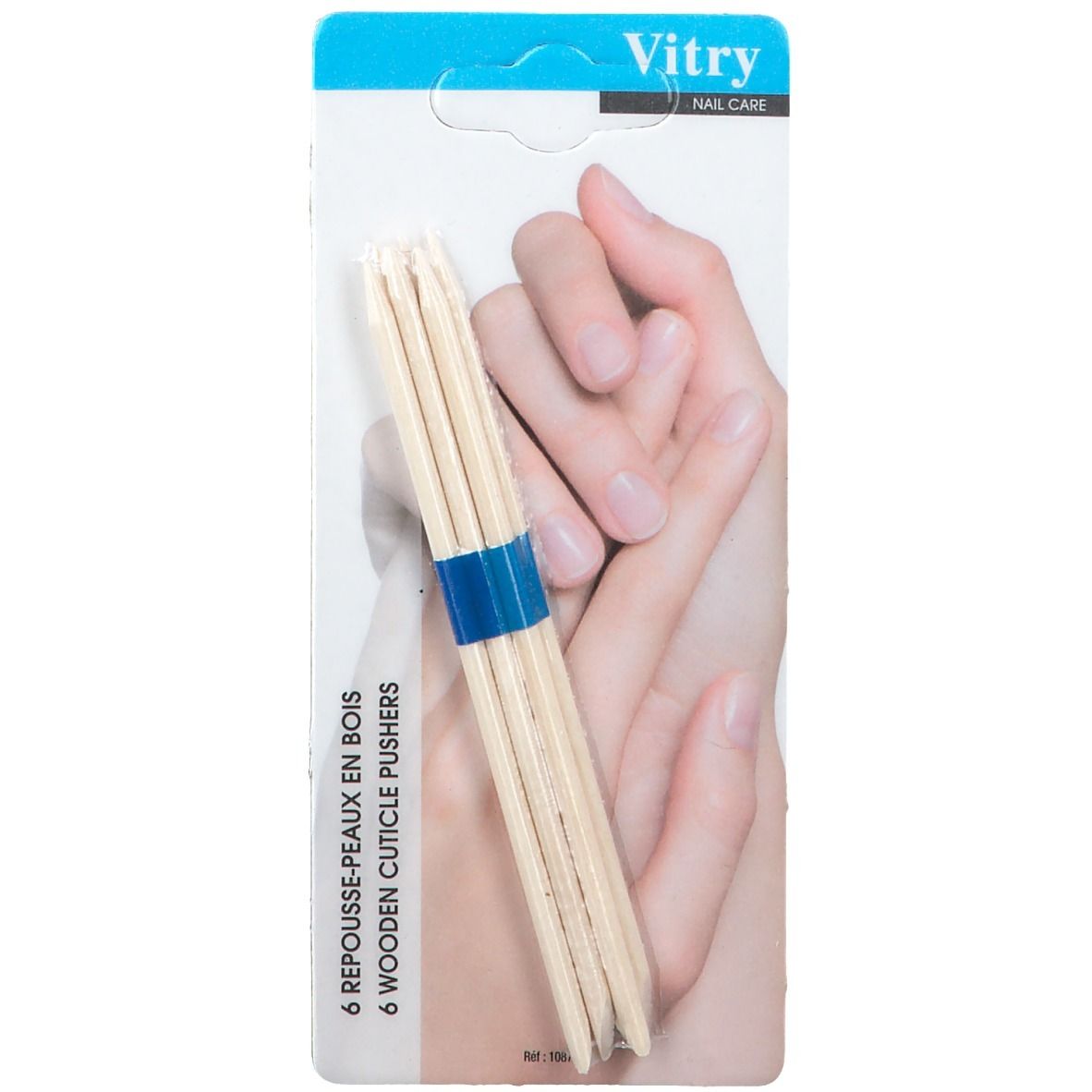 6 repousse-peaux en bois, liés par un élastique bleu. Emballage Vitry, mains en arrière-plan.