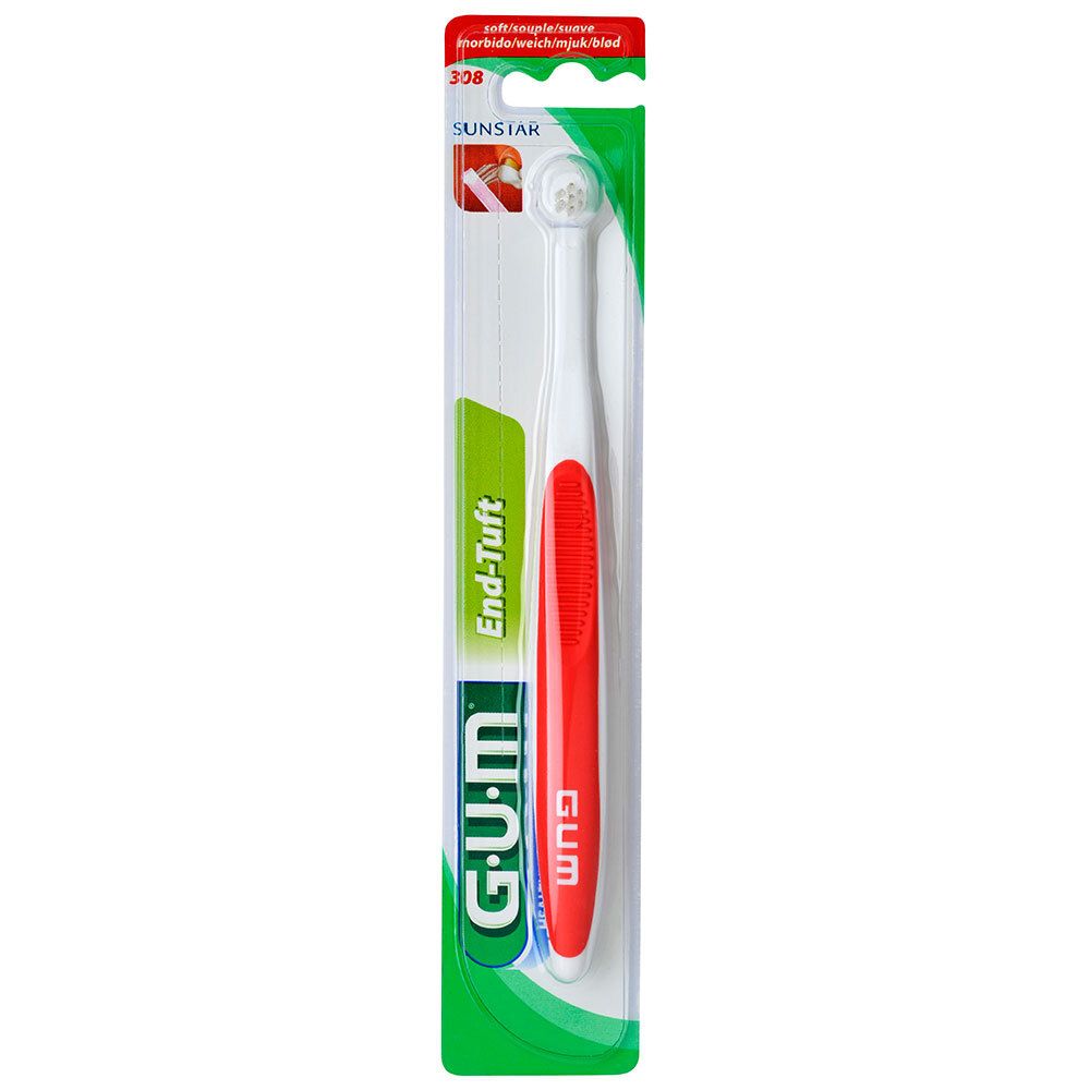 Zahnbürste mit rotem Griff und weißem Bürstenkopf in Blisterverpackung. Marke GUM, Modell End-Tuft.