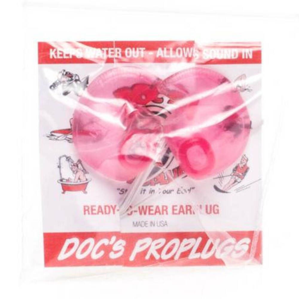 Bouchons d'oreille roses transparents dans un emballage plastique. Inscription : "DOC'S PROPLUGS". Texte : "READY-TO-WEAR EAR PLUG".