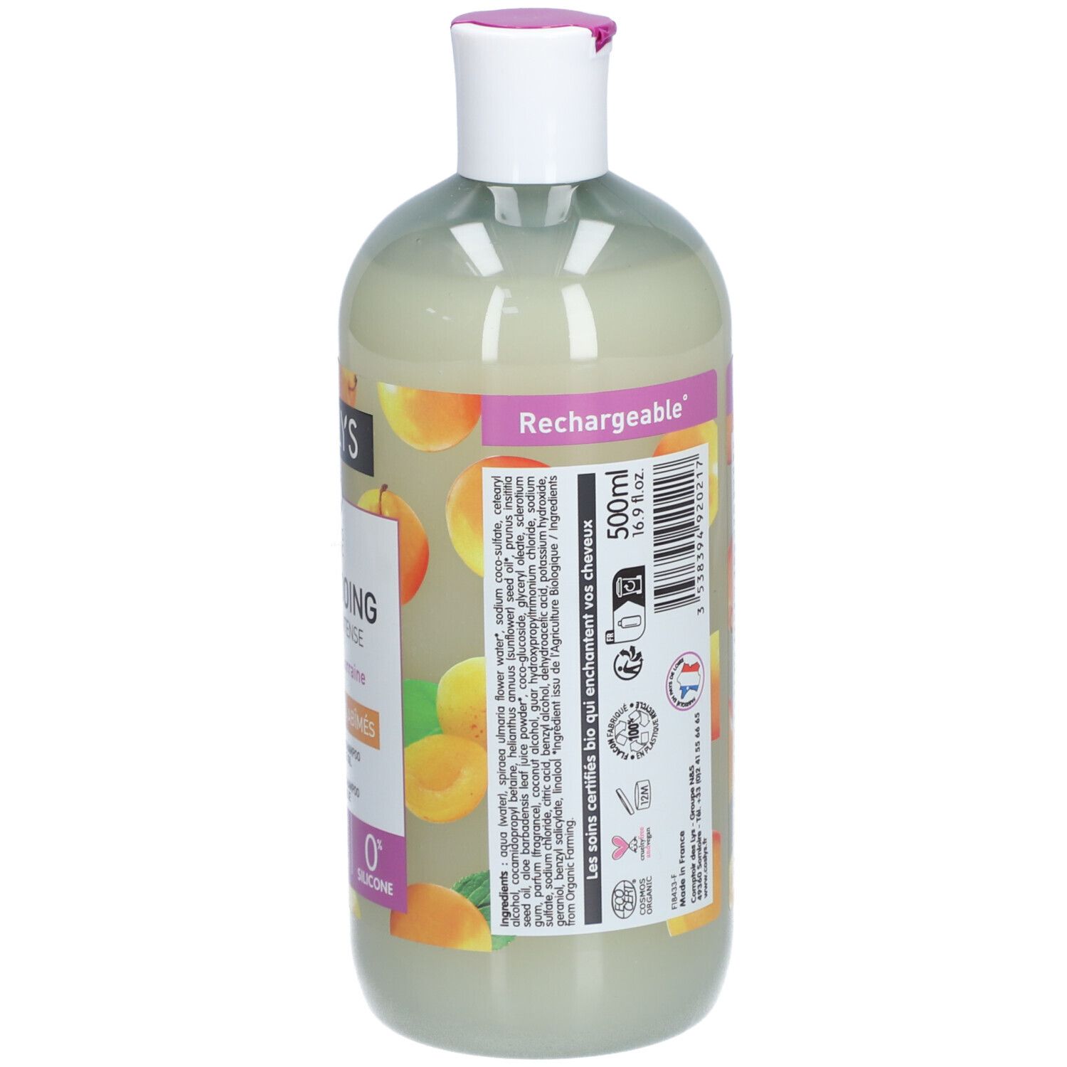 Dos du flacon Shampooing Nutrition Intense. Texte, illustrations d'abricots. 500ml. Bouchon blanc, touche rose.