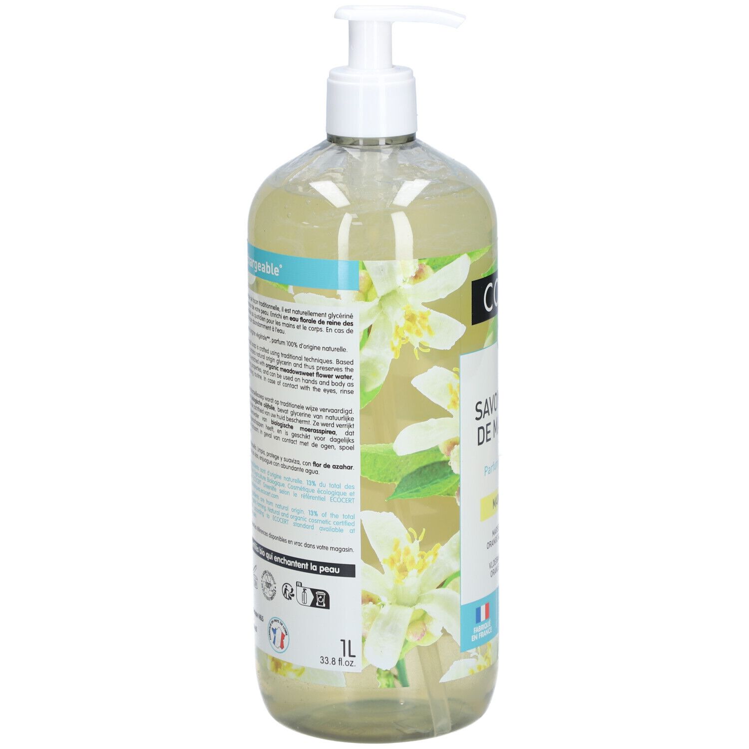 Transparante fles met pomp. Achterkant met meertalige tekst. Bevat informatie over het product en certificeringen.
