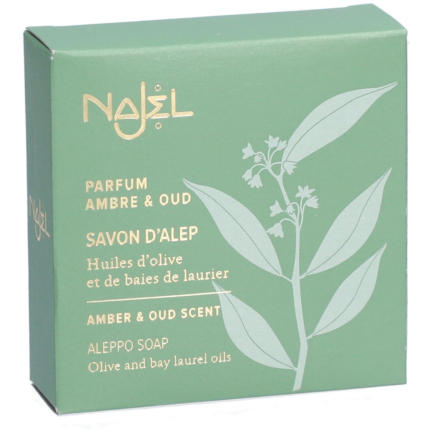 Boîte verte avec logo doré et informations produit. Texte: Parfum Ambre & Oud, Savon d'Alep, Huiles d'olive et de baies de laurier.