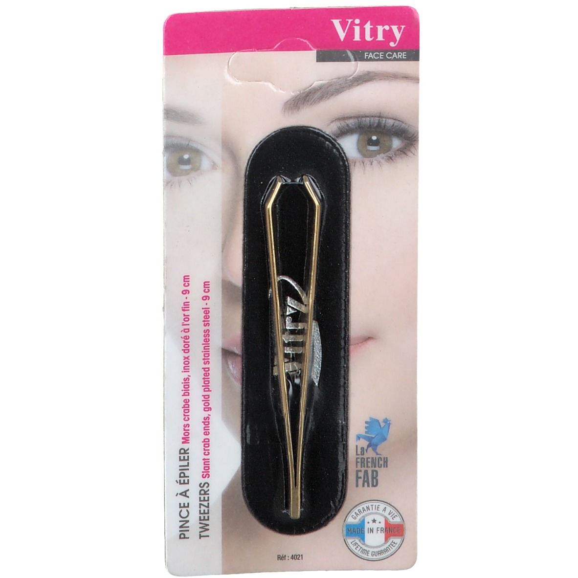 Pince à épiler dorée avec étui noir. Marque Vitry. Emballage avec image de visage.