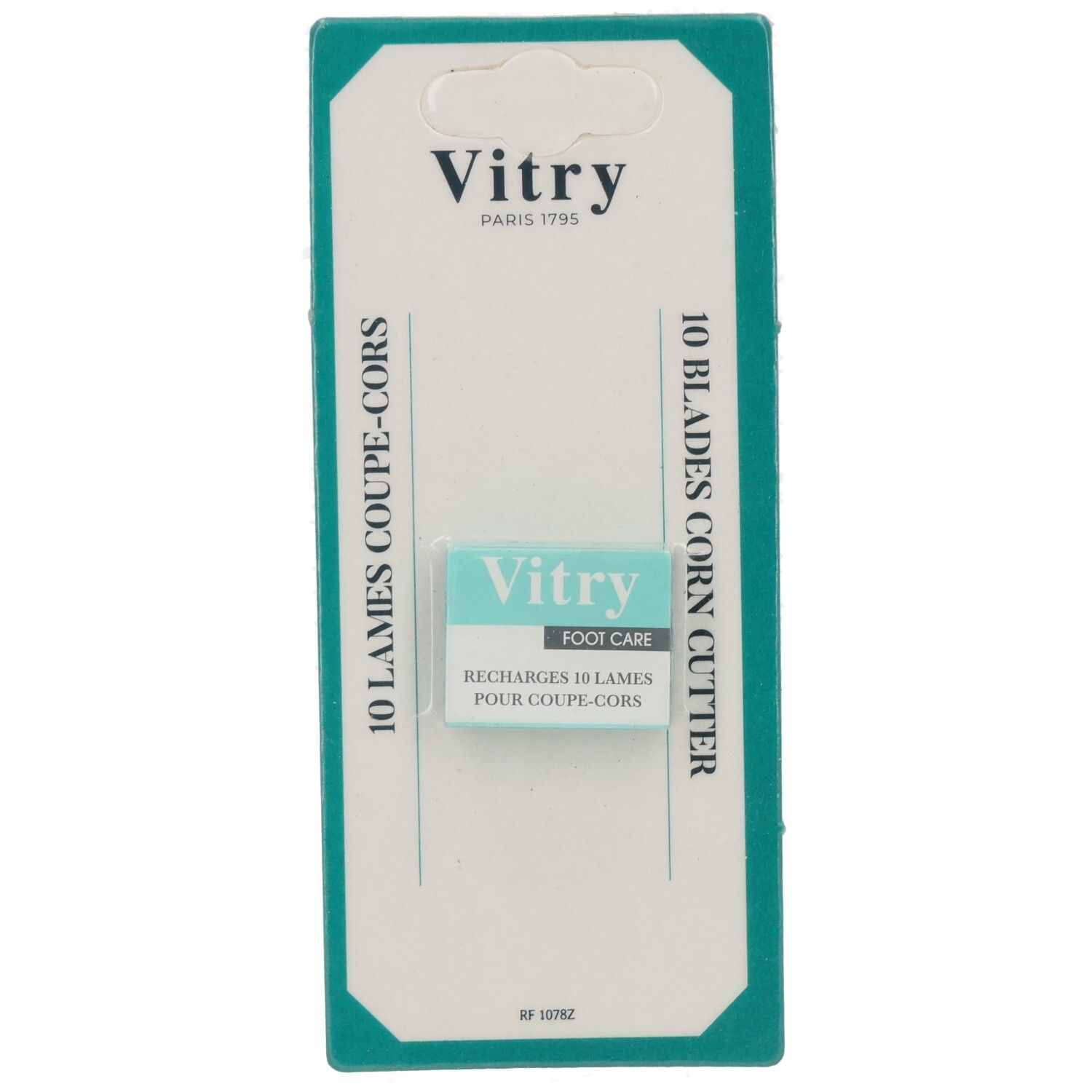 Verpackung mit Ersatzklingen. Marke Vitry, Fußpflege. Text: 10 Klingen, 10 lames coupe-cors. Hängevorrichtung.