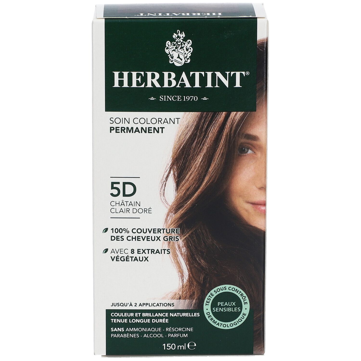 Boîte de coloration capillaire avec nom et nuance. Couvre 100% des cheveux gris et contient 8 extraits végétaux. Testé dermatologiquement.