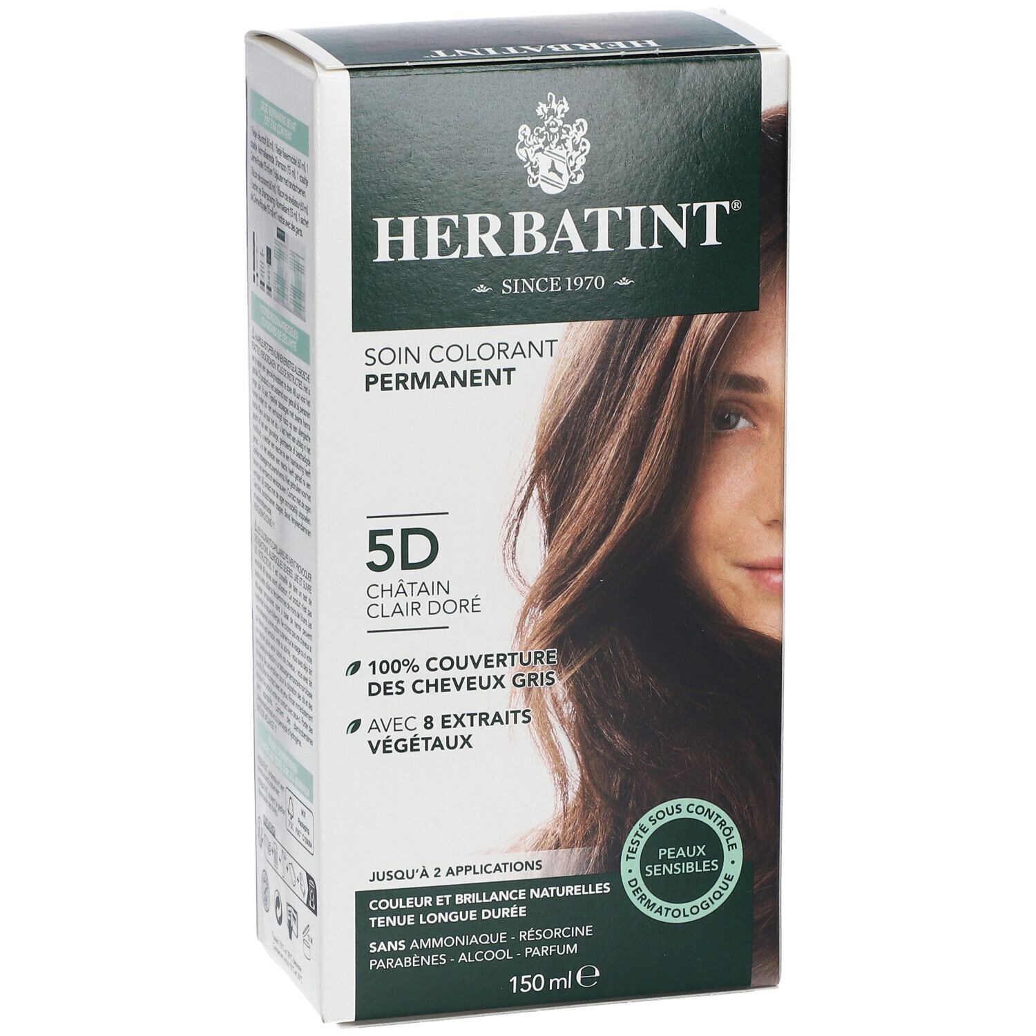 Boîte de coloration capillaire avec nom et nuance. Couvre 100% des cheveux gris et contient 8 extraits végétaux. Testé dermatologiquement.