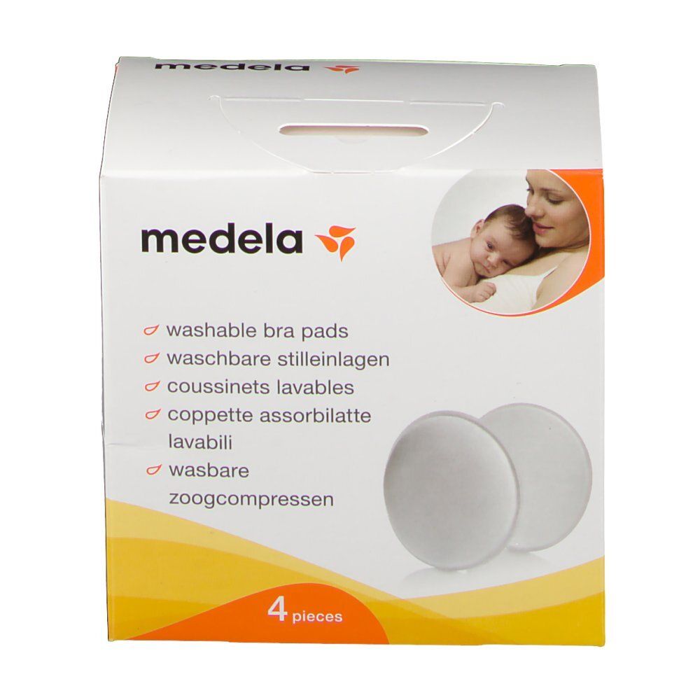 Verpackung mit zwei weißen, runden Stilleinlagen. Aufgedruckt: Medela, Waschbare Stilleinlagen, 4 Stück.