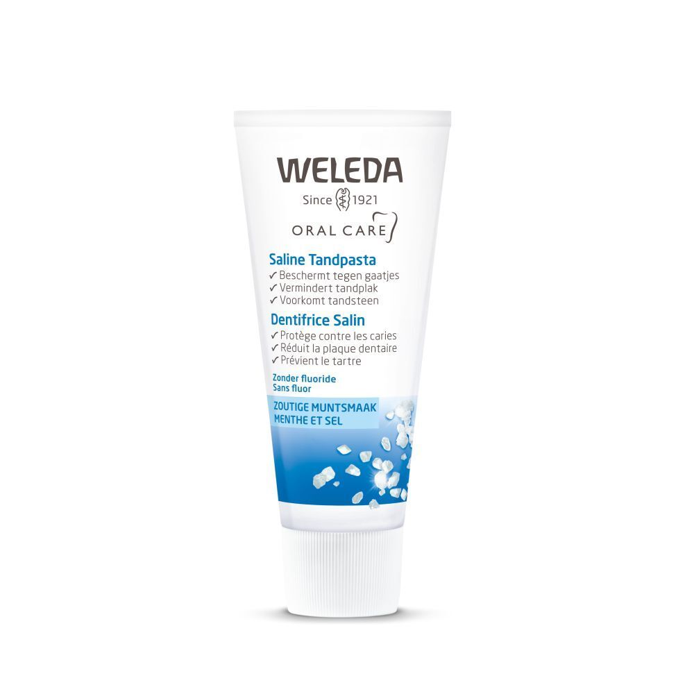 Tube de dentifrice Weleda Saline. Blanc, avec texte bleu et vert. Contient du texte en allemand, néerlandais et français.