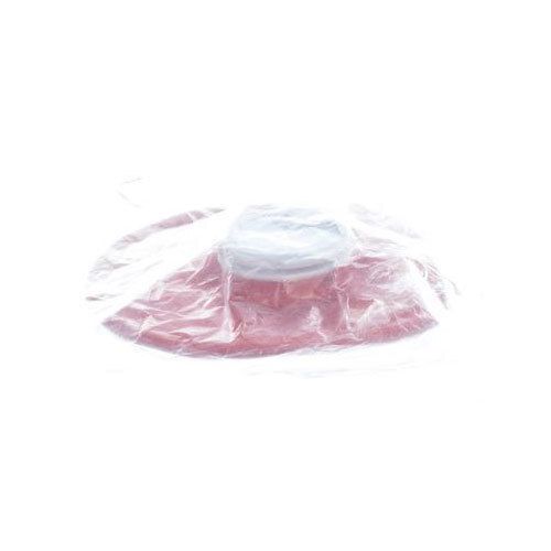 Objet rond rouge dans un emballage transparent. Partie supérieure blanche et cylindrique. Produit emballé dans du plastique.