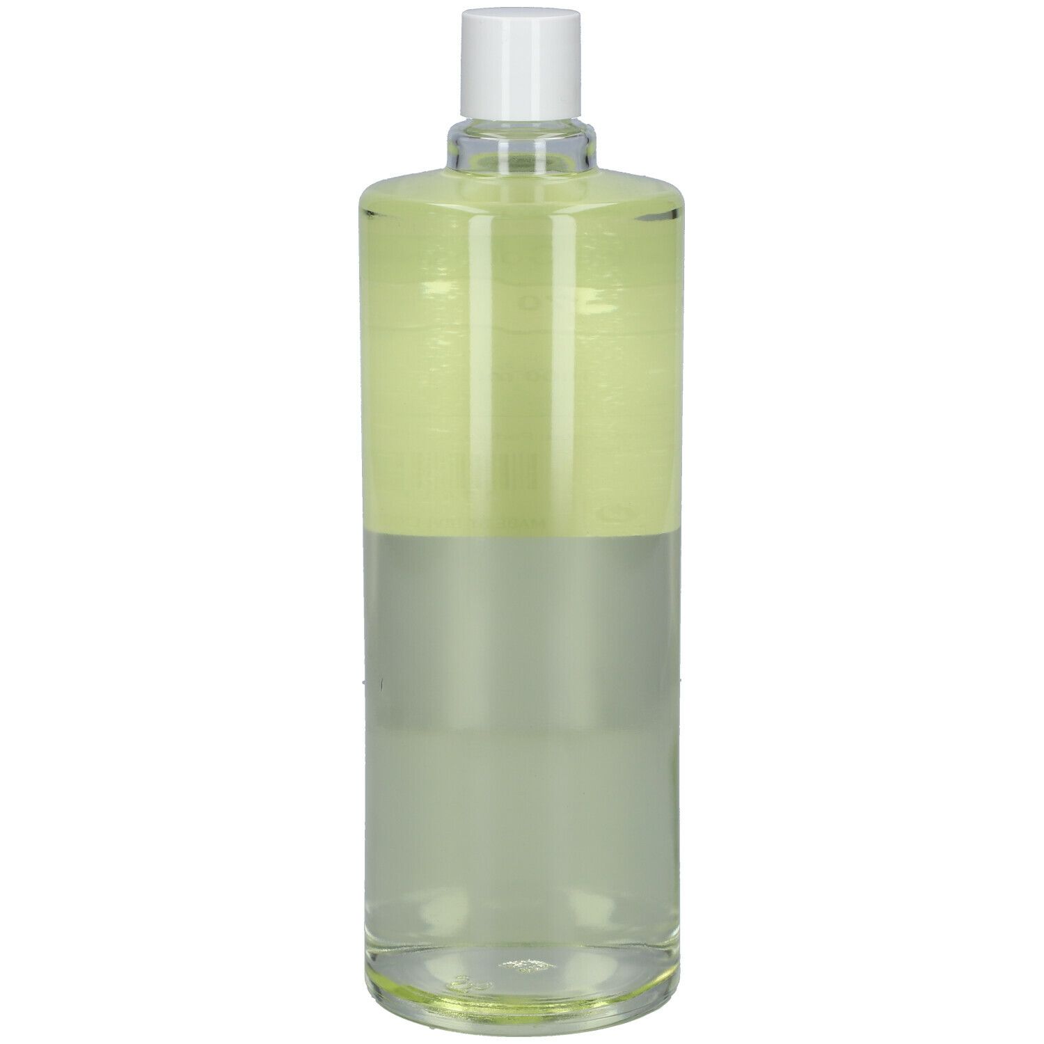 Flacon transparent avec bouchon blanc. Liquide divisé en deux couches.