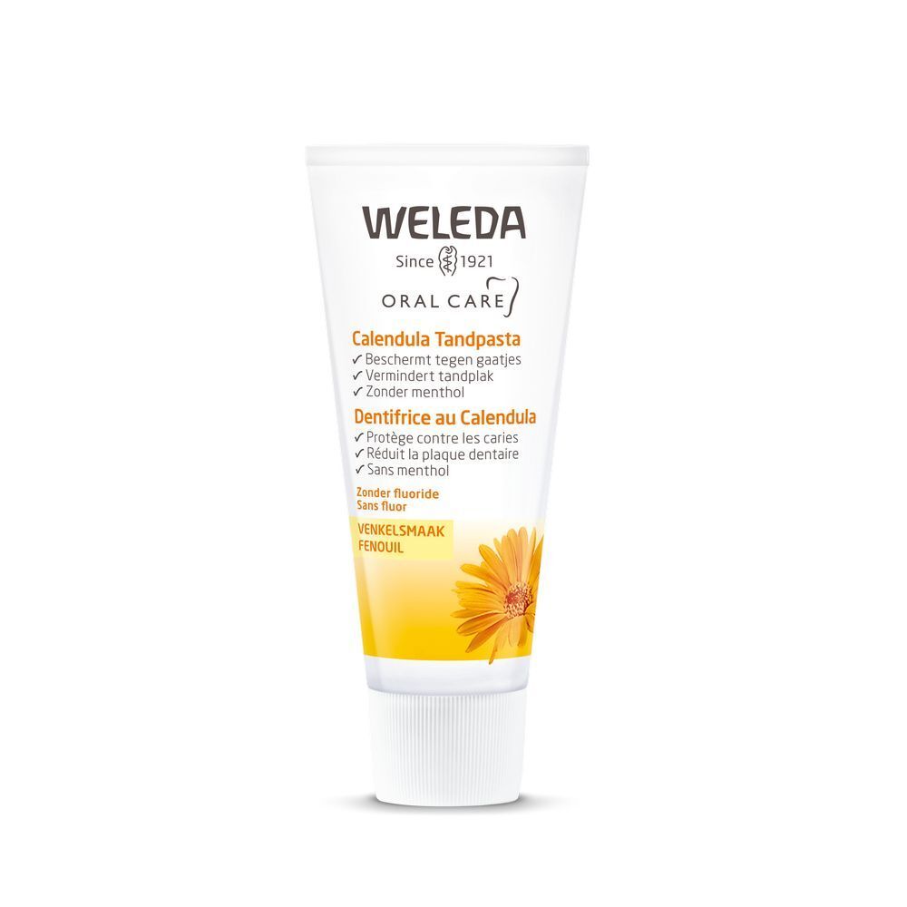 Tube de dentifrice Weleda Calendula. Ingrédients et indications sur l'emballage. Illustration florale et logo de la marque.