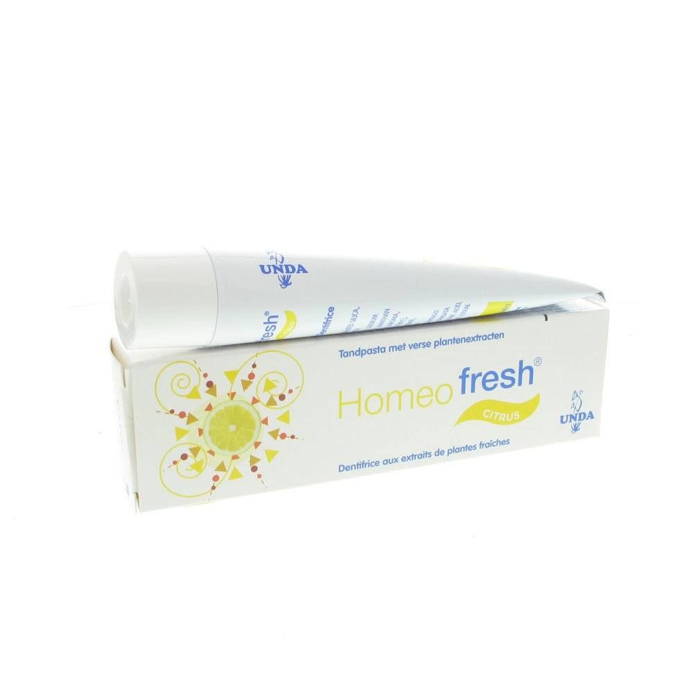 Tube et boîte de dentifrice. Inscription Homeofresh Citrus. Logo jaune. Marque UNDA.