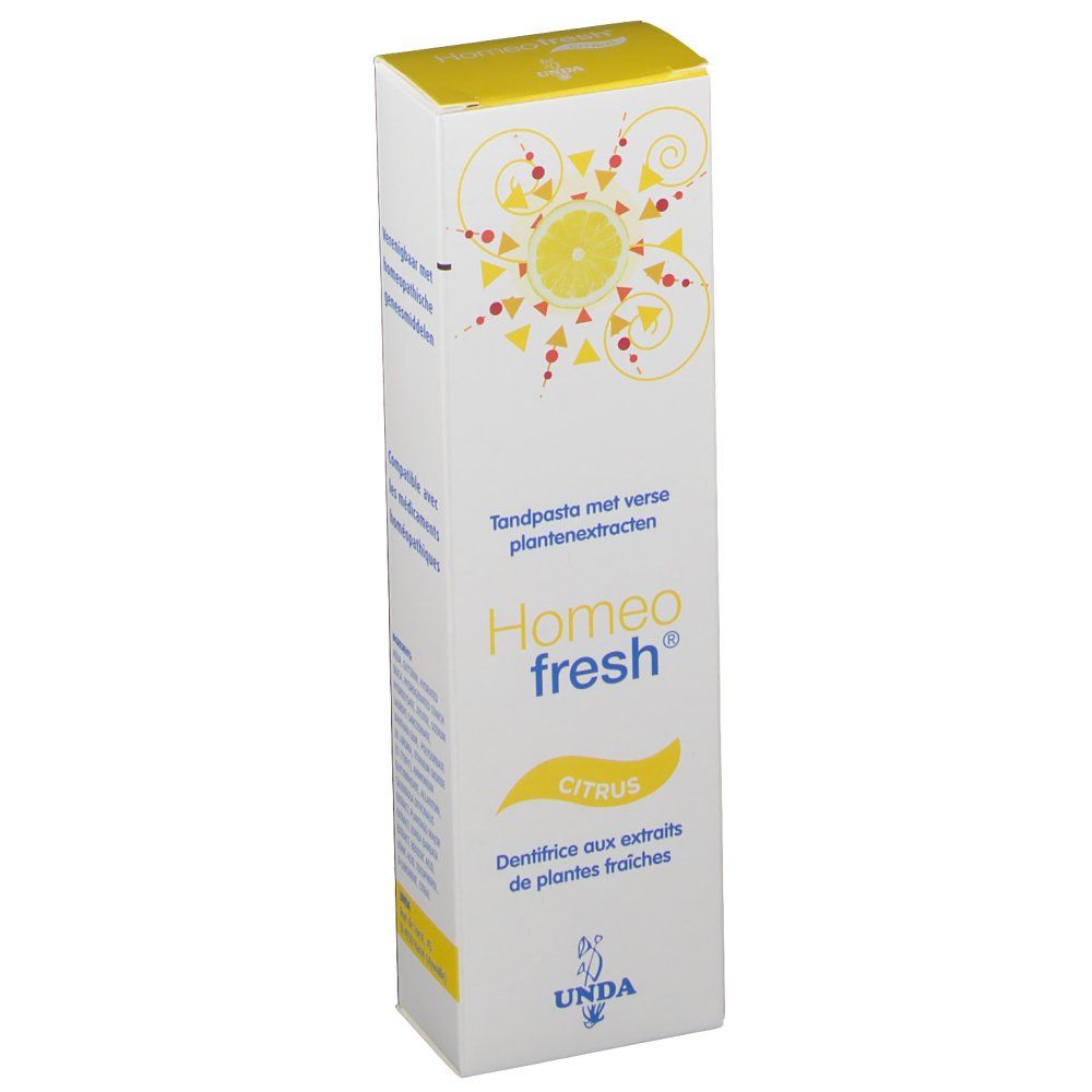 Boîte de dentifrice. Inscription Homeofresh Citrus. Logo jaune. Marque UNDA. Texte multilingue.