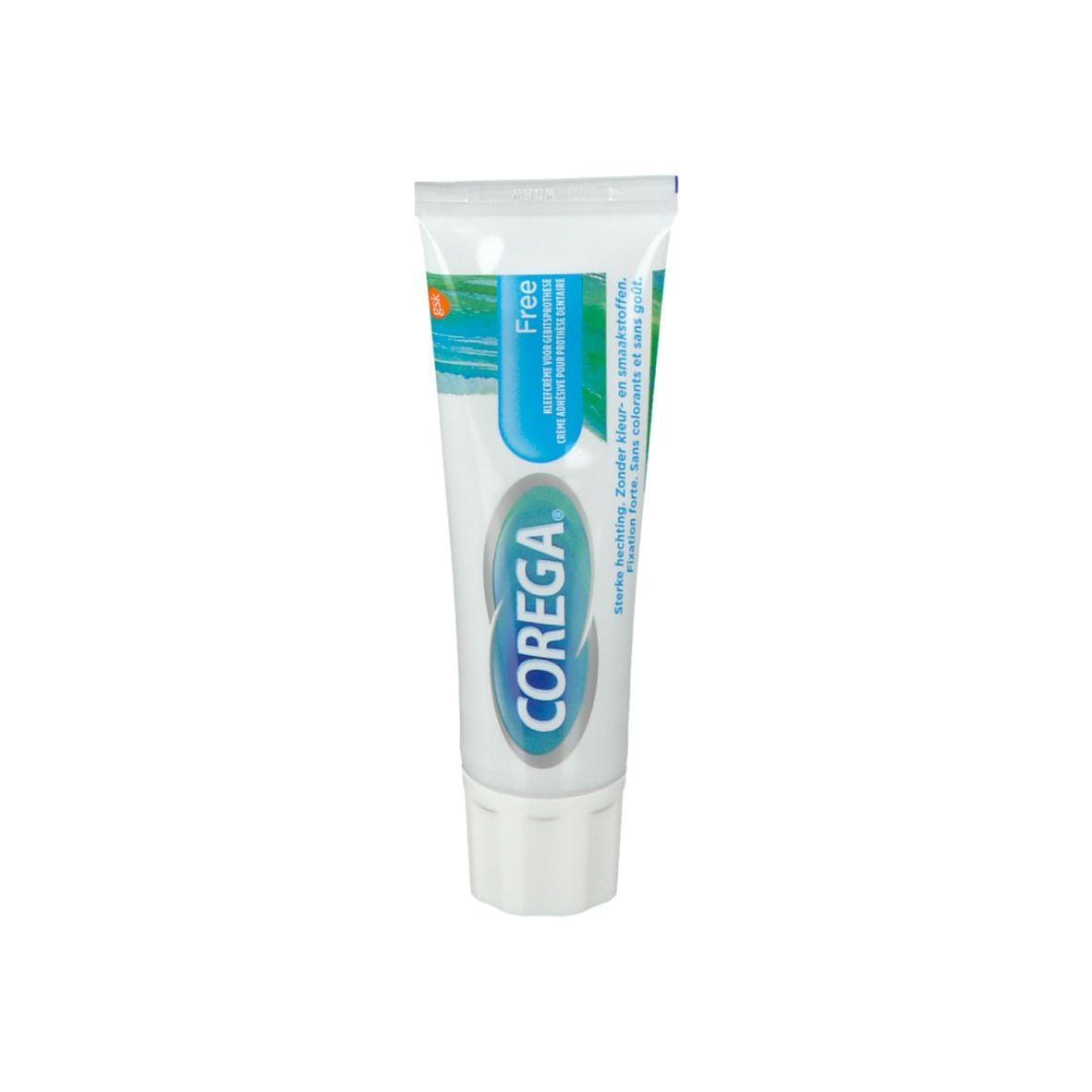 Tube de crème adhésive pour prothèses dentaires COREGA® Free. Tube blanc avec bande bleue et texte. 40g.