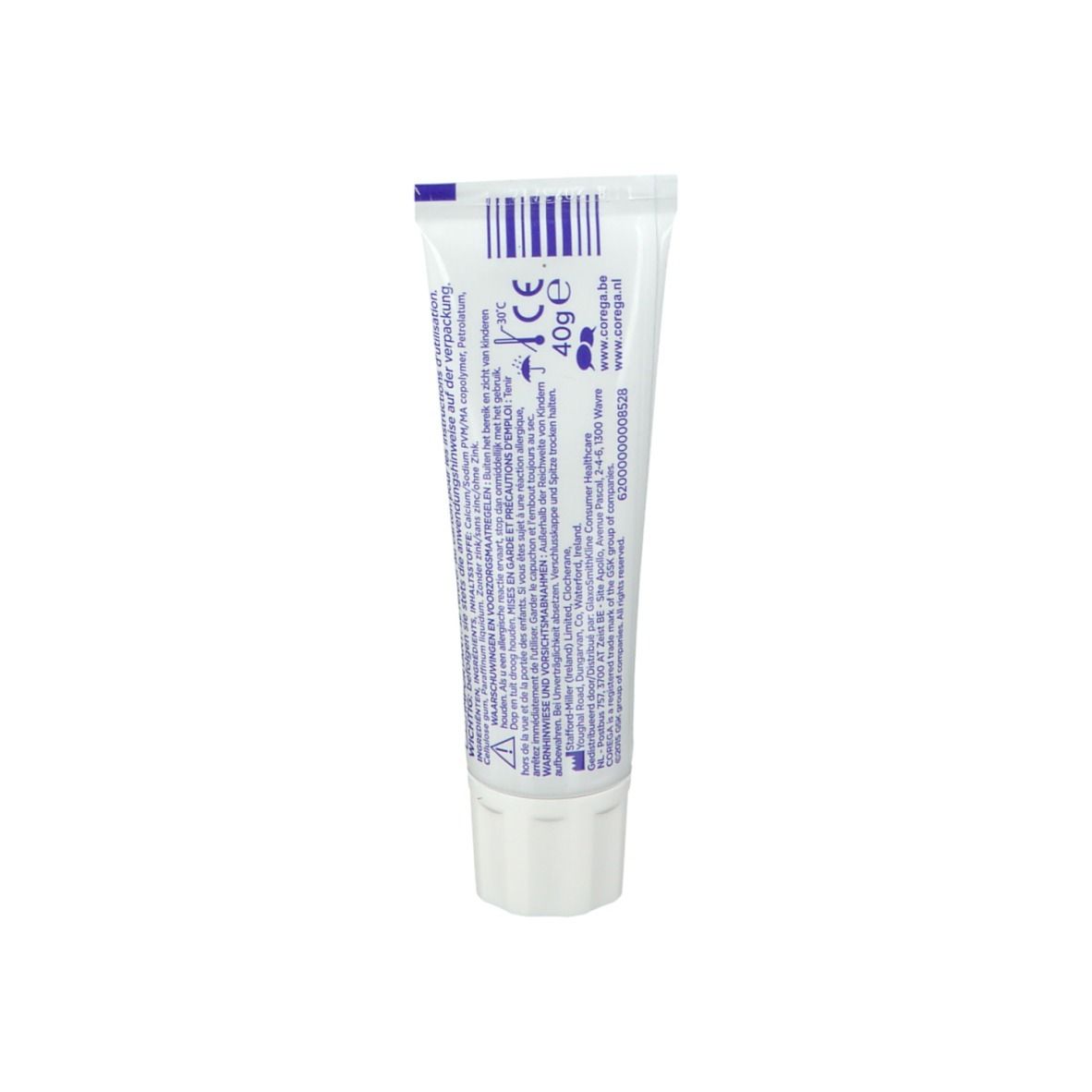 Dos du tube de crème adhésive pour prothèses dentaires COREGA® Free. Tube blanc avec texte et code-barres.