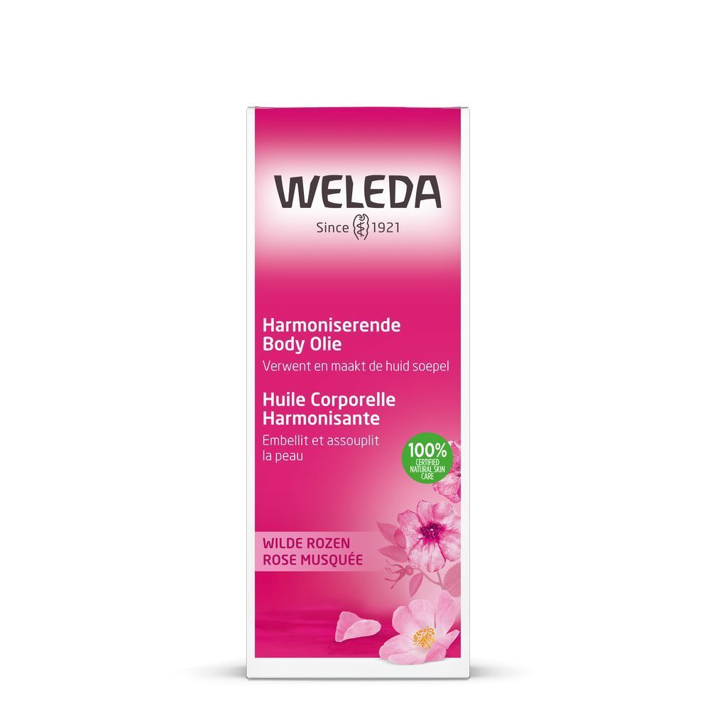 Emballage du produit. Boîte rose avec nom du produit et logo. Écriture verte et blanche.