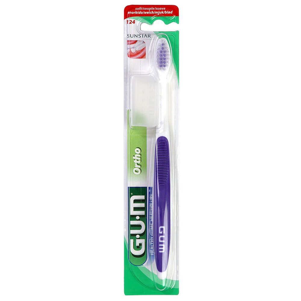 Zahnbürste mit lila Griff und weißem Bürstenkopf. Verpackung mit Produktnamen und Marke GUM Ortho.