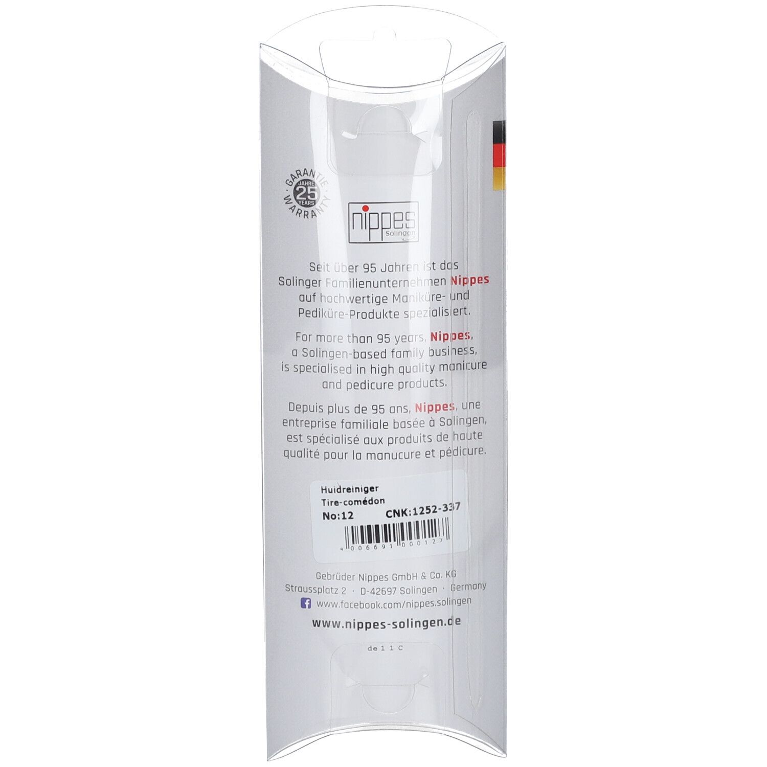 Rückseite der Verpackung des Nippes Mitesserentferners. Text in Deutsch, Englisch und Französisch. Barcode und Logo.