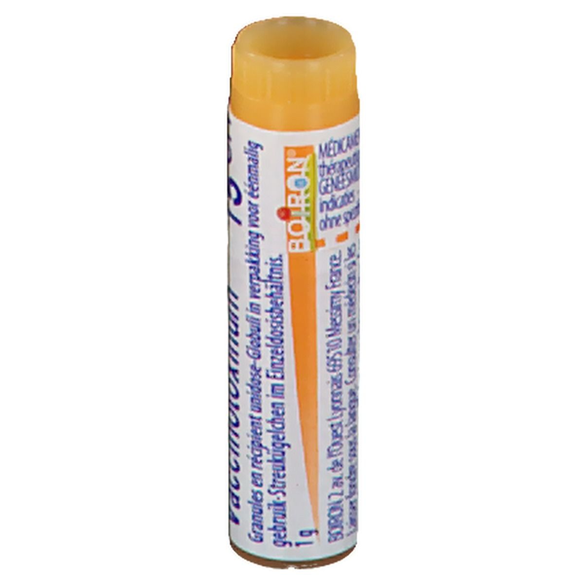 Tube cylindrique avec bouchon jaune. Inscription: Boiron, Vaccinotoxinum 1 g.