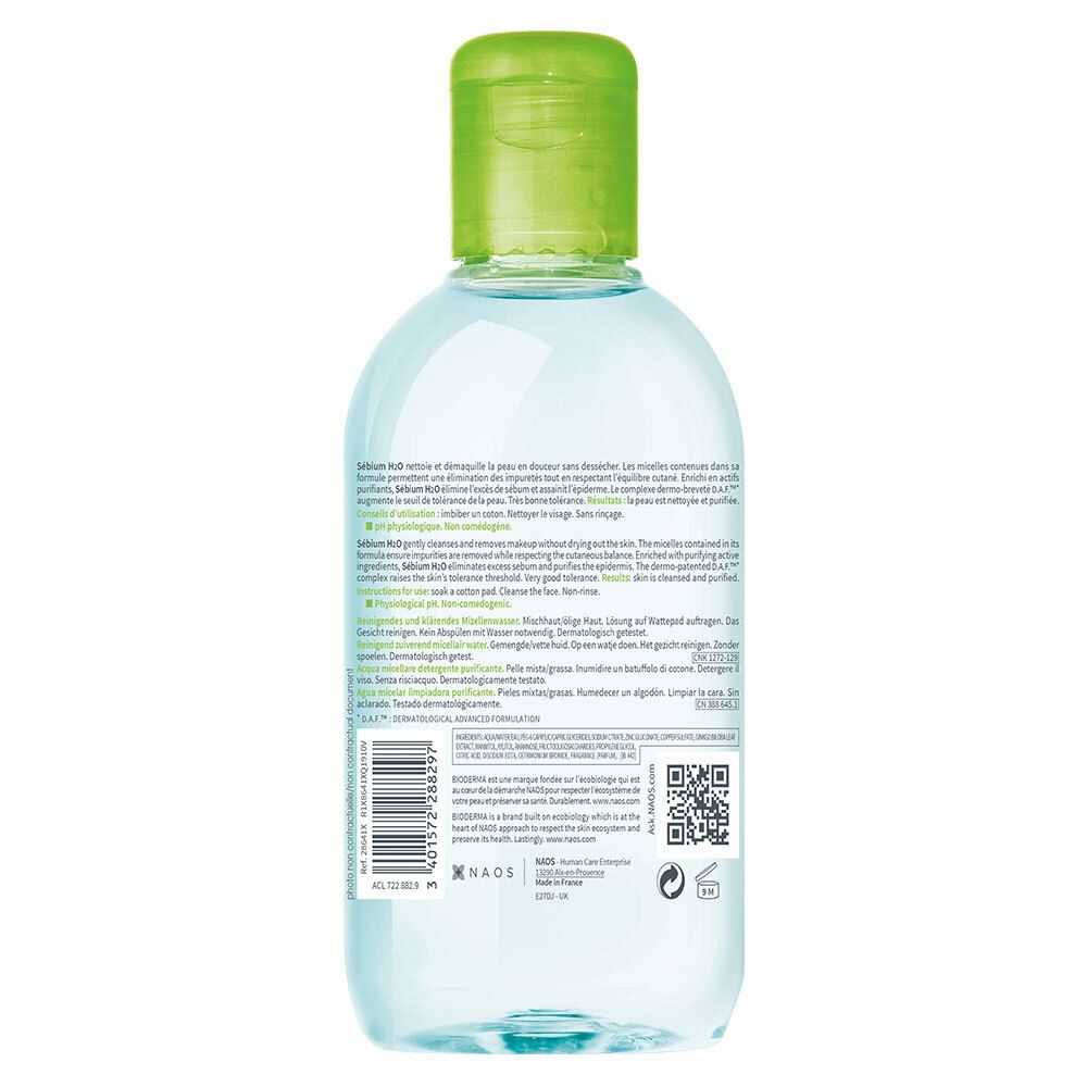 Dos du flacon BIODERMA Sébium H2O. Texte sur l'étiquette. Code-barres et QR code. Bouchon vert. Eau nettoyante bleue claire.
